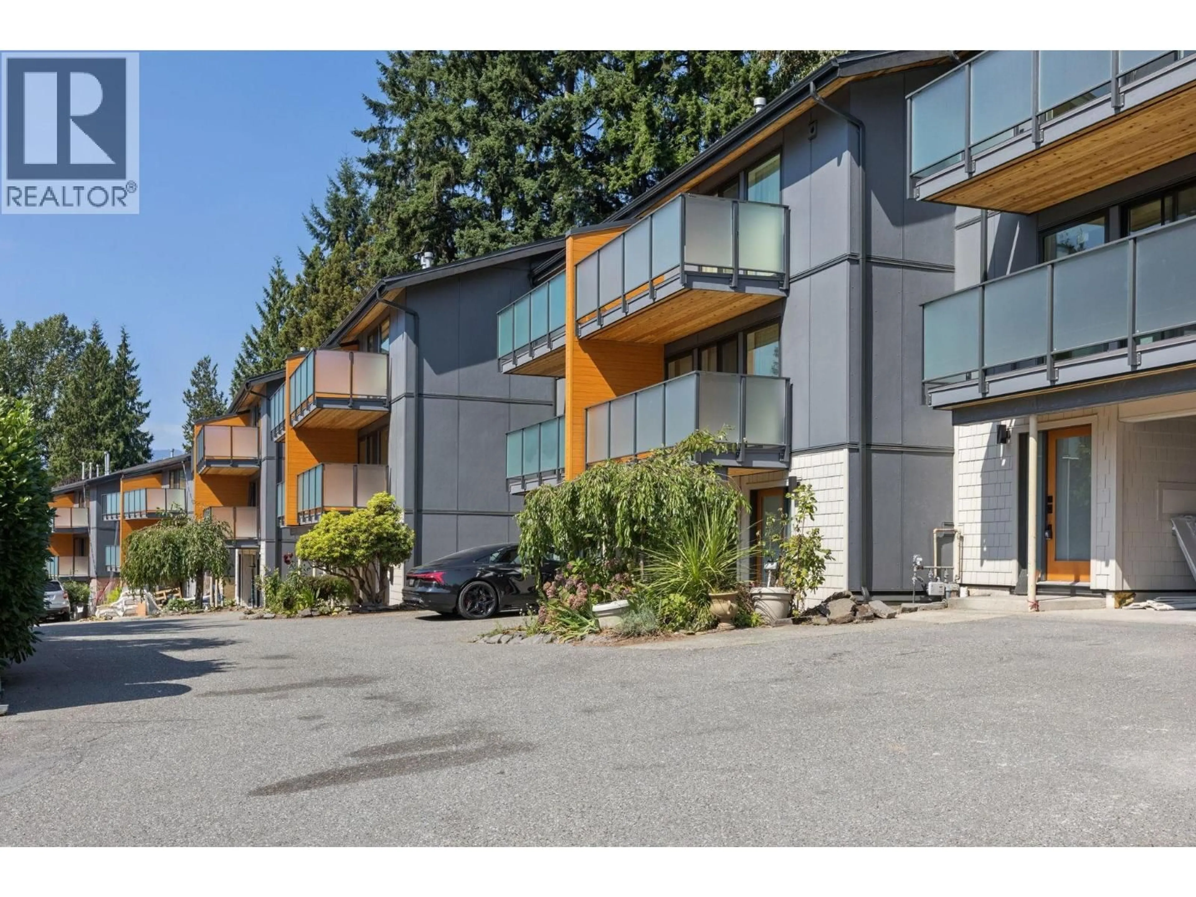 A pic from outside/outdoor area/front of a property/back of a property/a pic from drone, street for 1084 LILLOOET ROAD, North Vancouver British Columbia V7J2H8