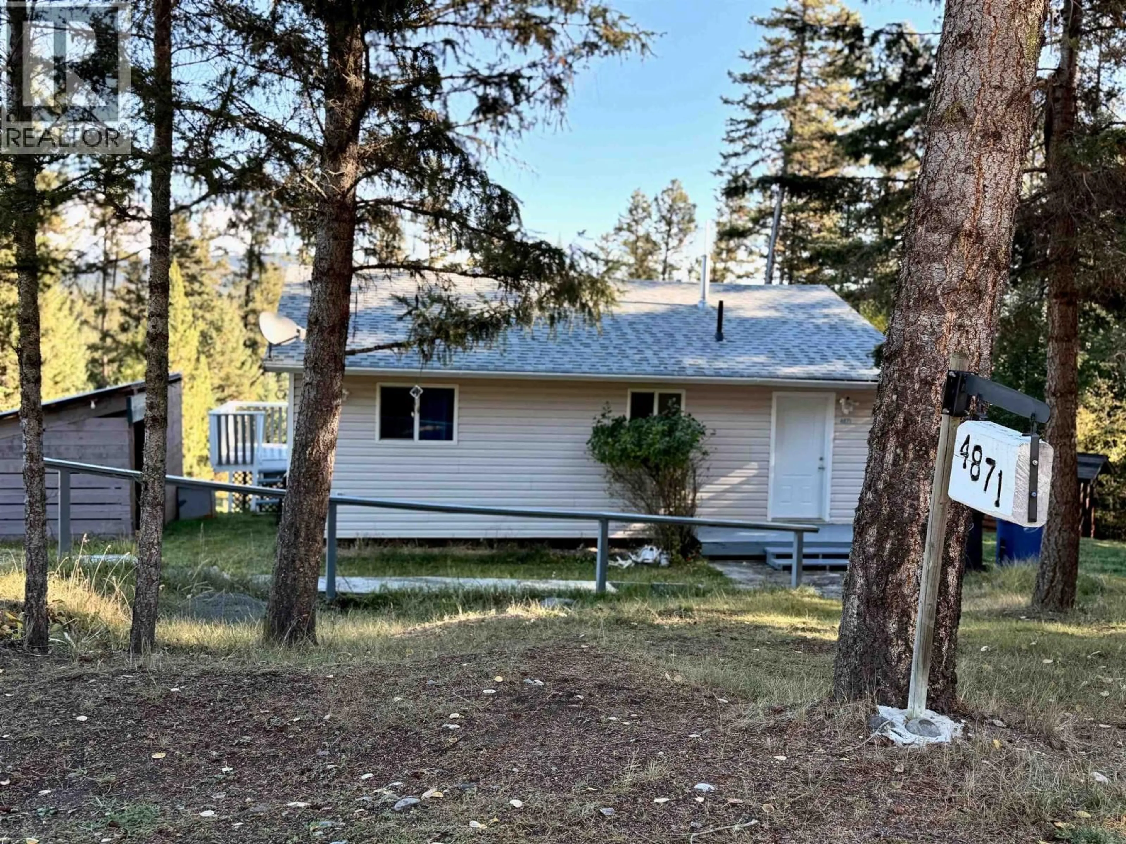 A pic from outside/outdoor area/front of a property/back of a property/a pic from drone, unknown for 4871 STEWART ROAD, 100 Mile House British Columbia V0K2Z0