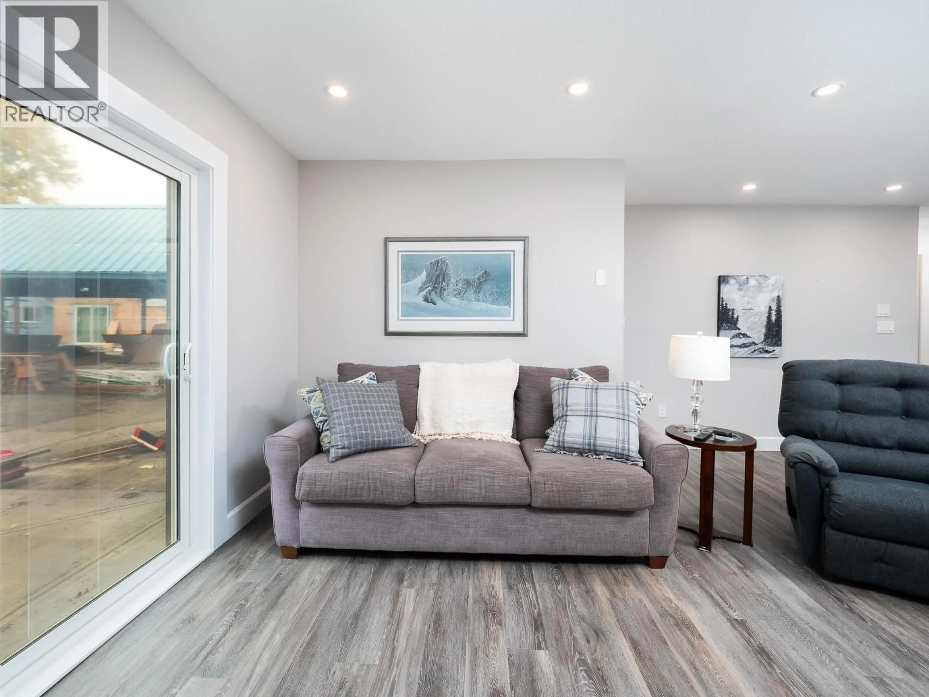 Living room with furniture, wood/laminate floor for 112 - 3033 OSPIKA BOULEVARD, Prince George British Columbia V2N4L5