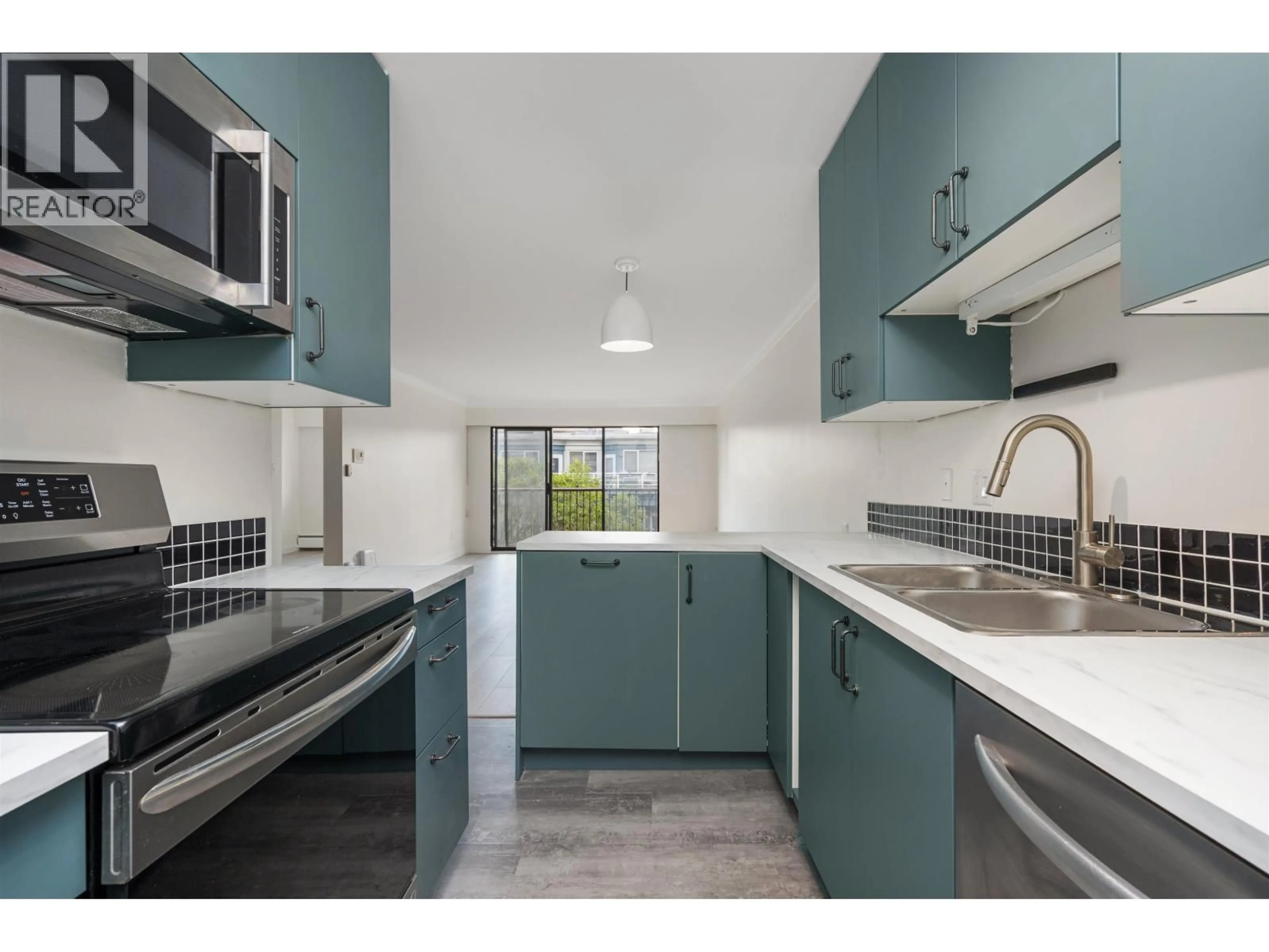 Standard kitchen, ceramic/tile floor for 204 - 127 4TH STREET, North Vancouver British Columbia V7L1H7