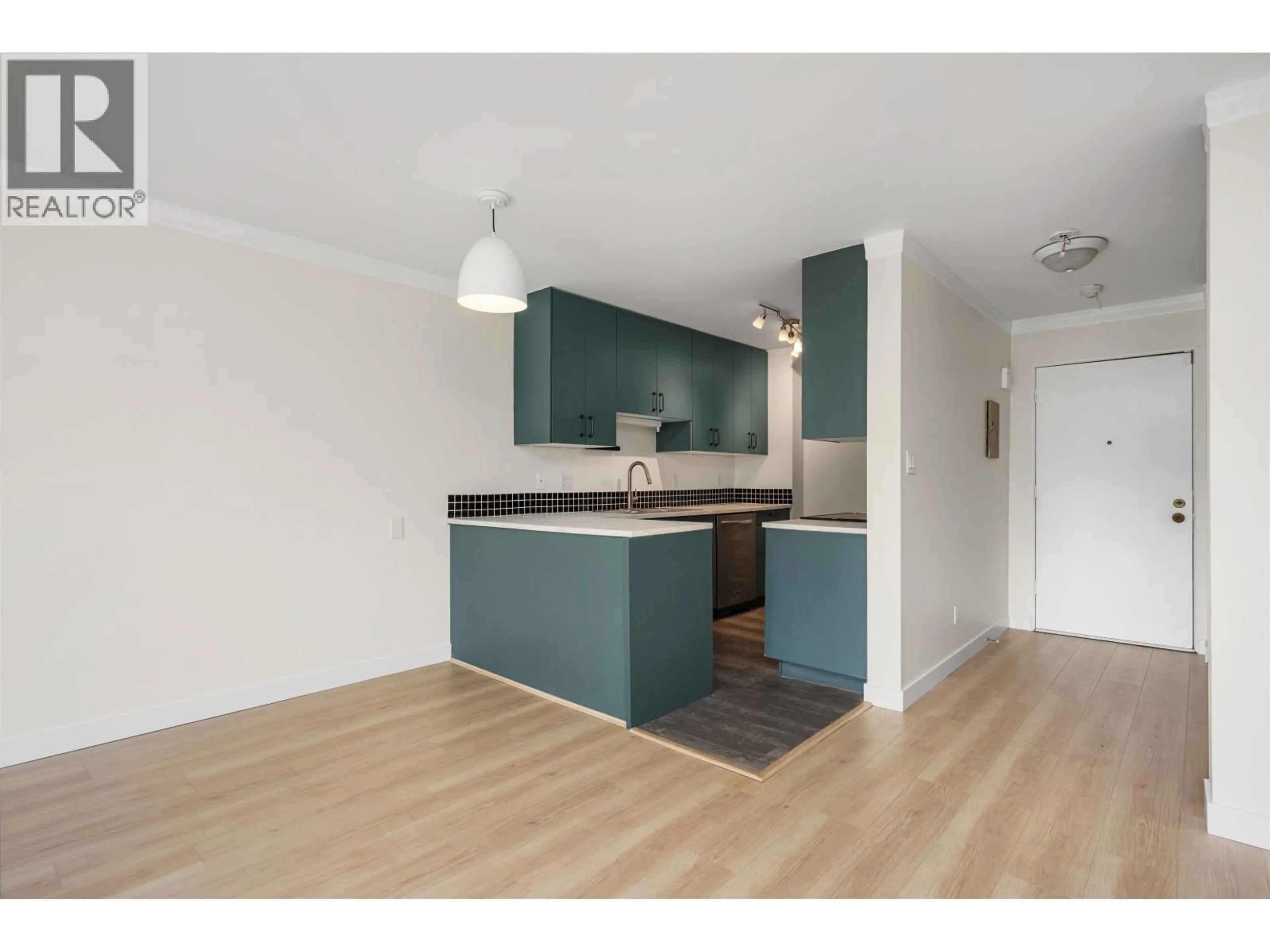 Standard kitchen, wood/laminate floor for 204 - 127 4TH STREET, North Vancouver British Columbia V7L1H7