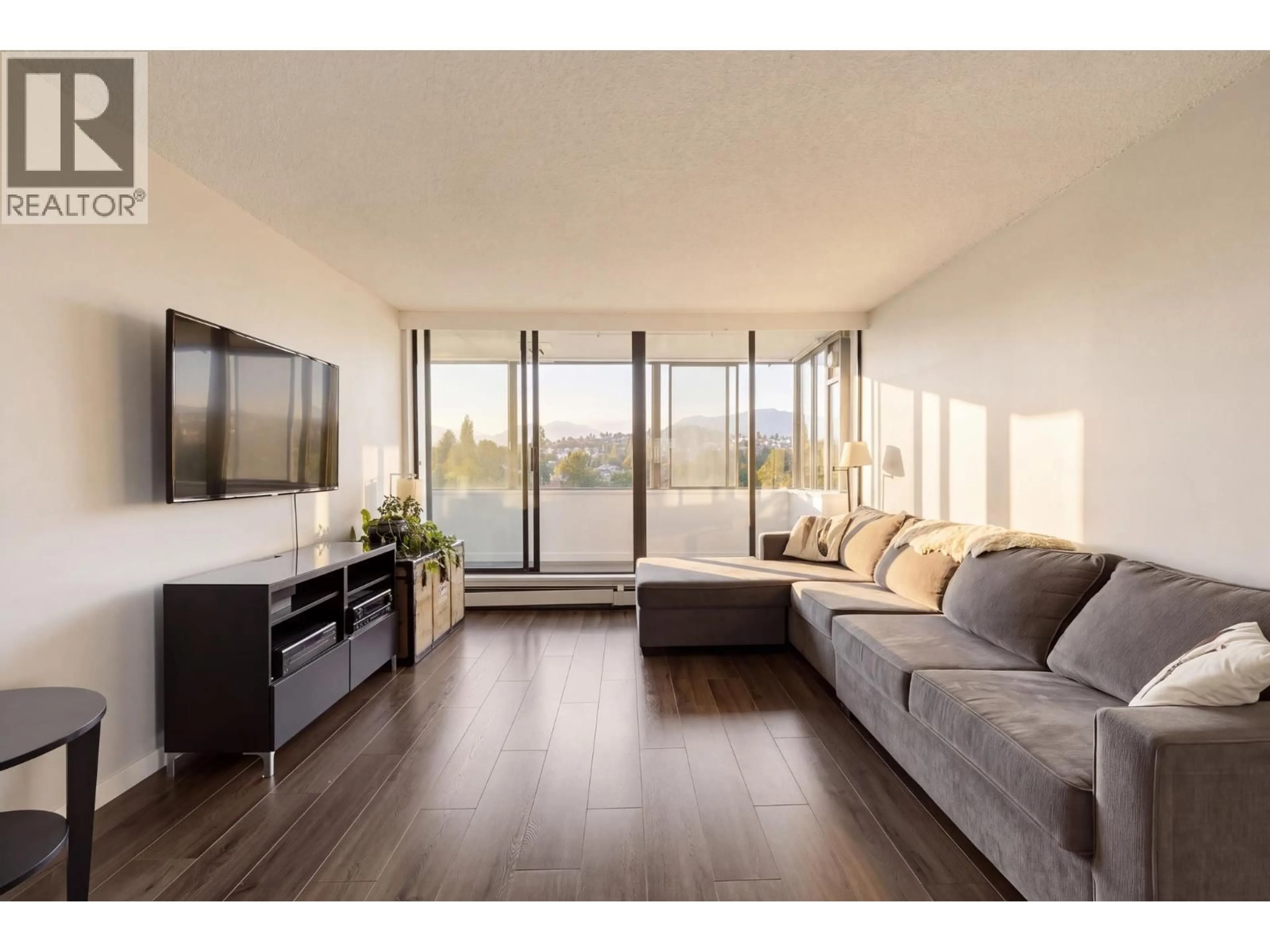 Living room with furniture, wood/laminate floor for 1303 - 2060 BELLWOOD AVENUE, Burnaby British Columbia V5B4V2