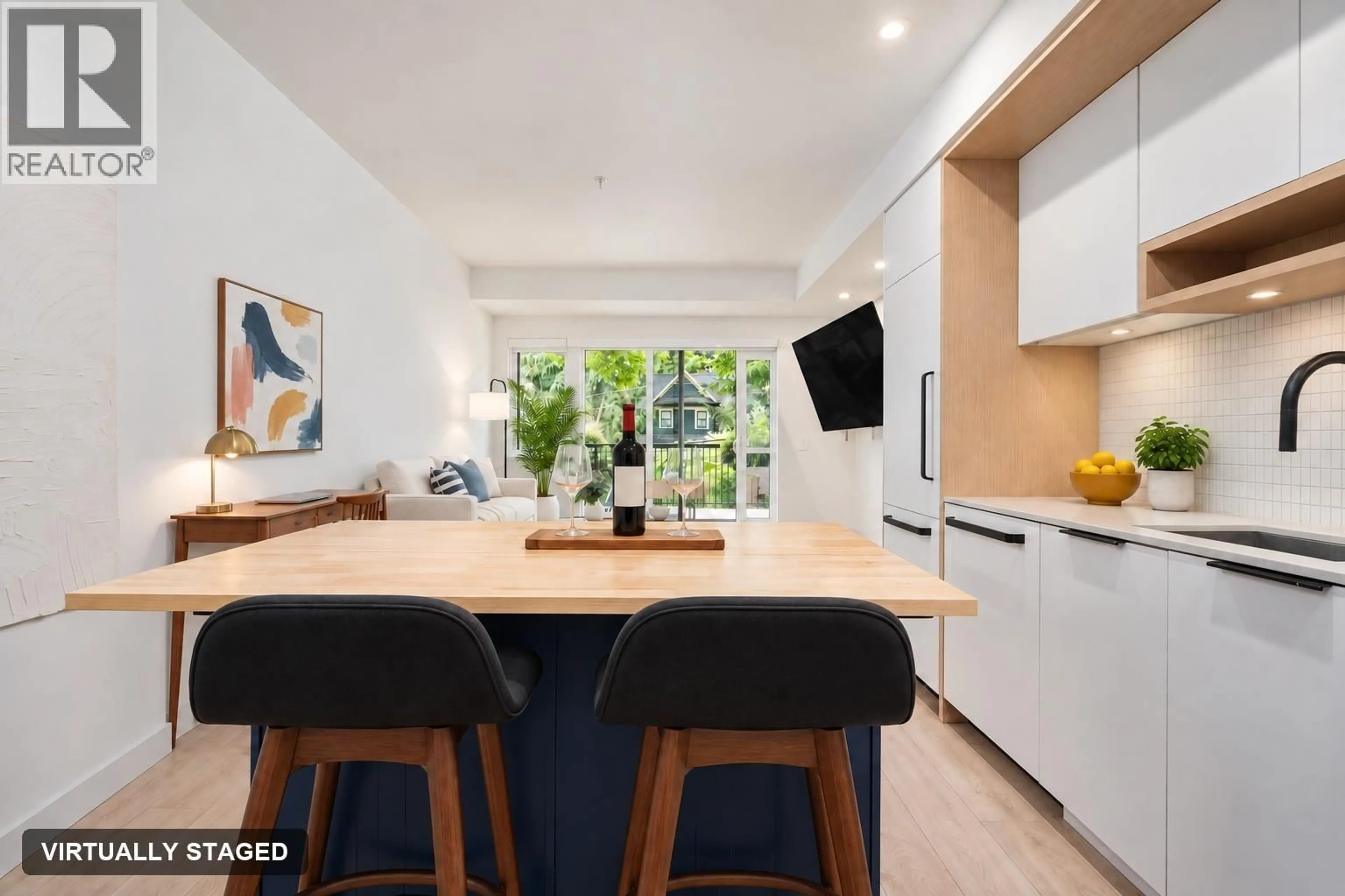 Open concept kitchen, wood/laminate floor for 212 - 2520 GUELPH STREET, Vancouver British Columbia V5T0K7