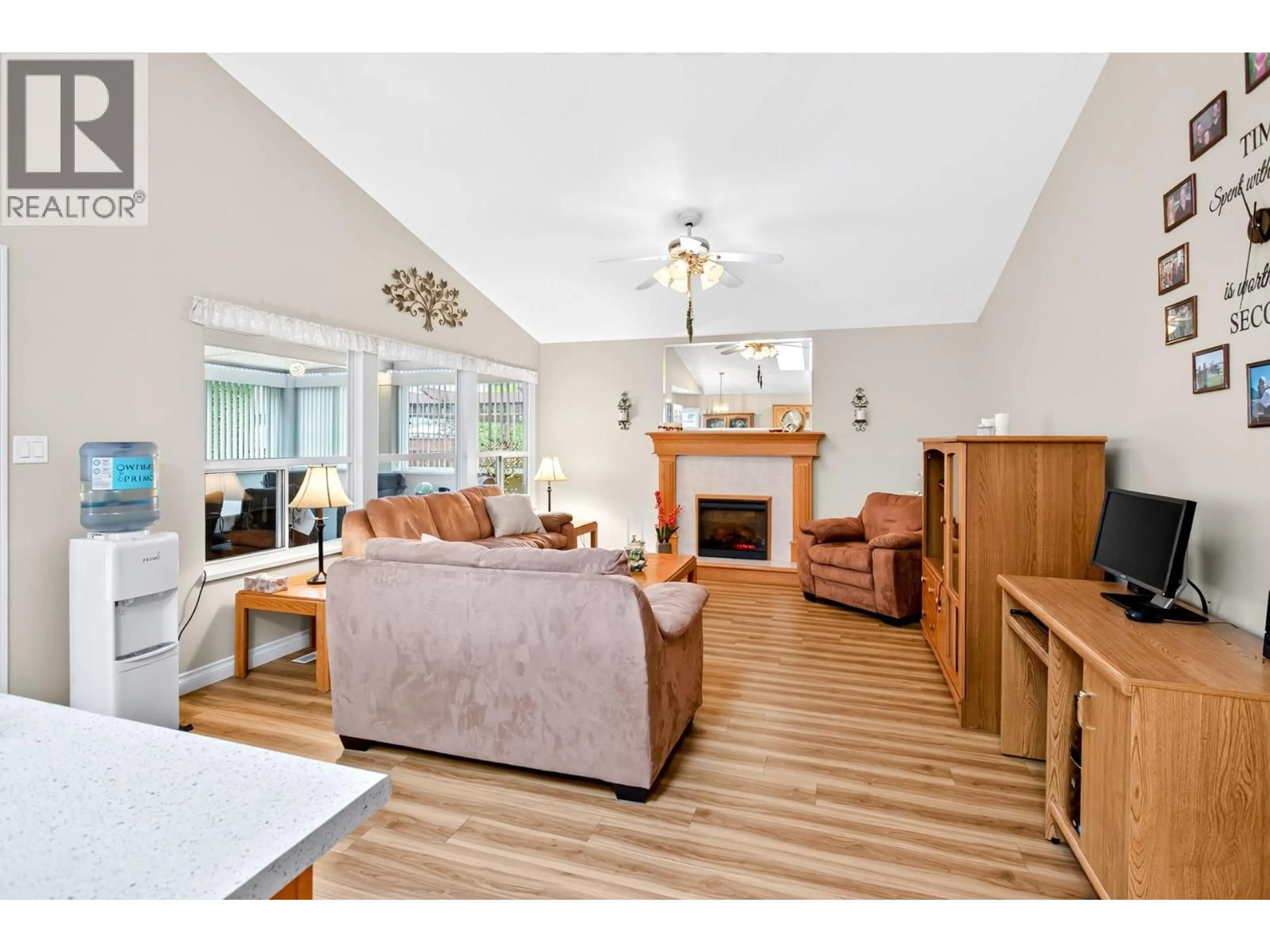 Living room with furniture, wood/laminate floor for 11690 206A STREET, Maple Ridge British Columbia V2X0X8
