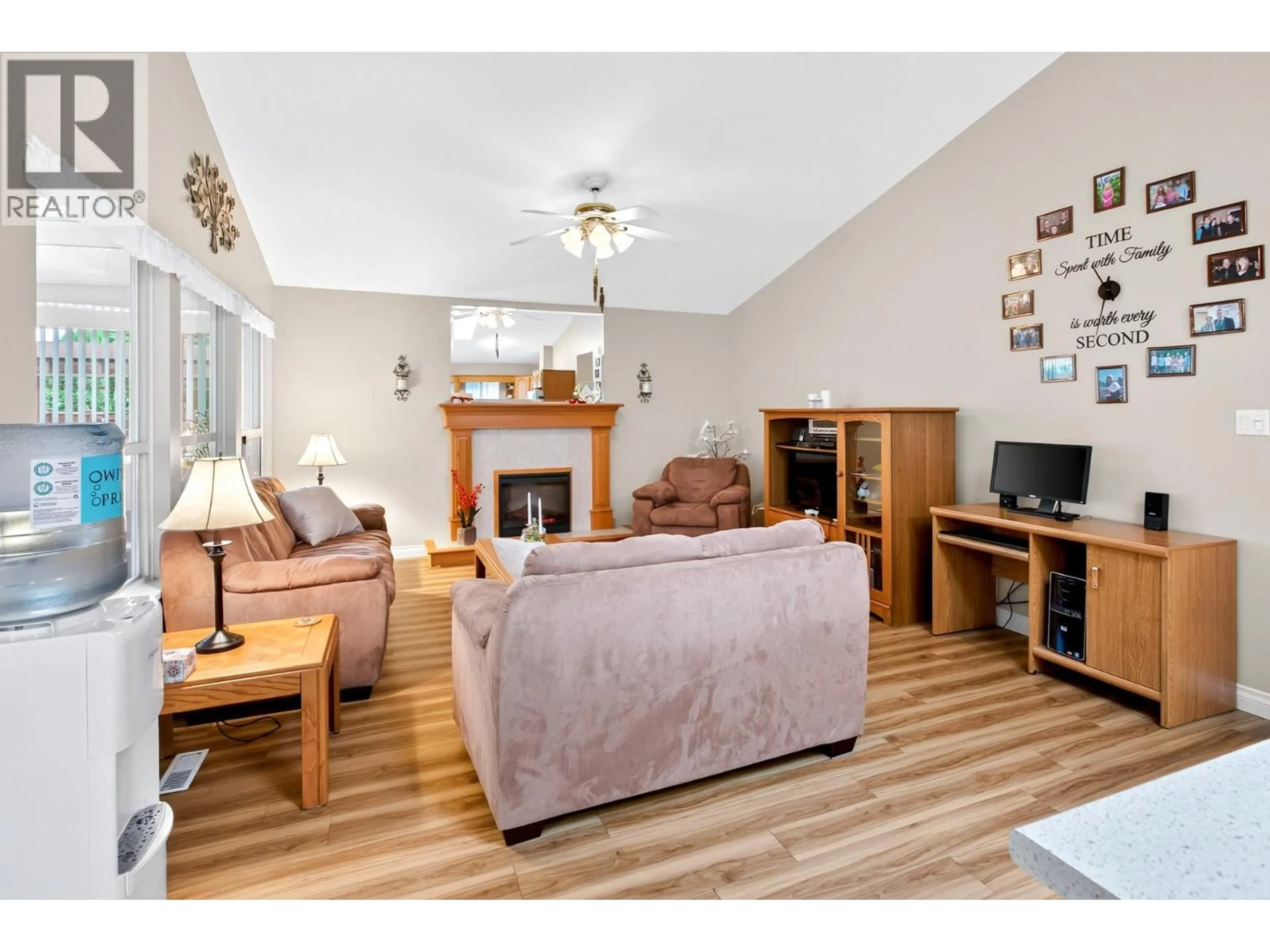 Living room with furniture, wood/laminate floor for 11690 206A STREET, Maple Ridge British Columbia V2X0X8