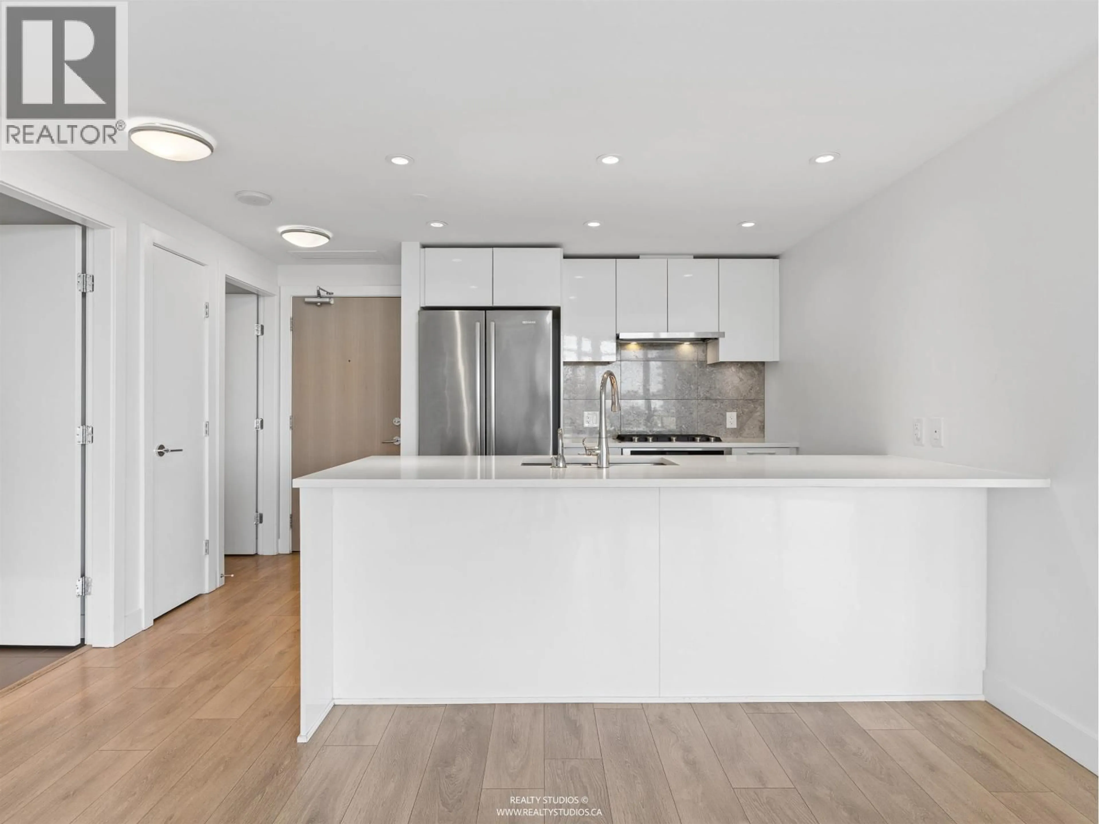 Open concept kitchen, unknown for 701 - 3557 SAWMILL CRESCENT, Vancouver British Columbia V5S0E2