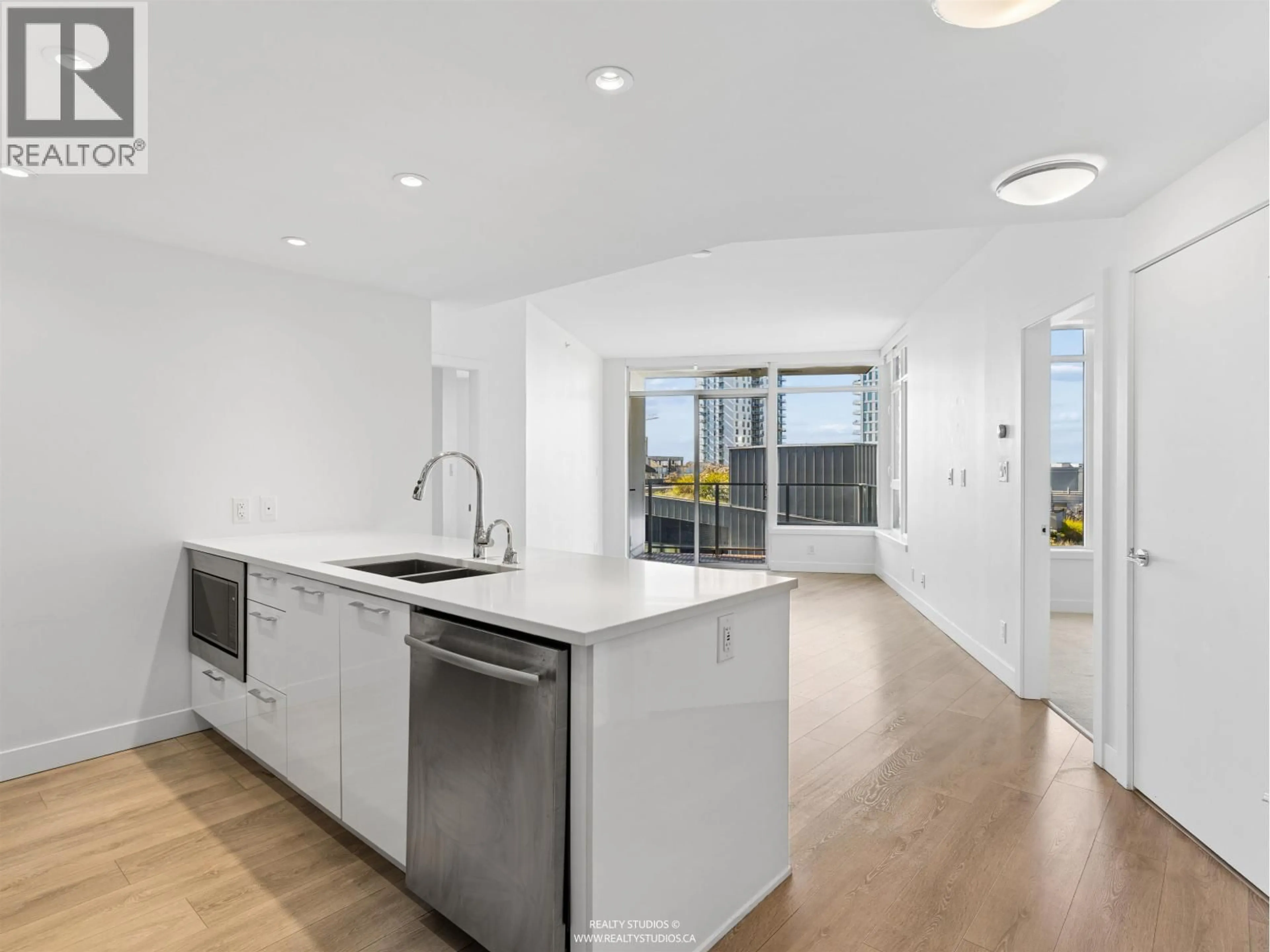 Open concept kitchen, unknown for 701 - 3557 SAWMILL CRESCENT, Vancouver British Columbia V5S0E2