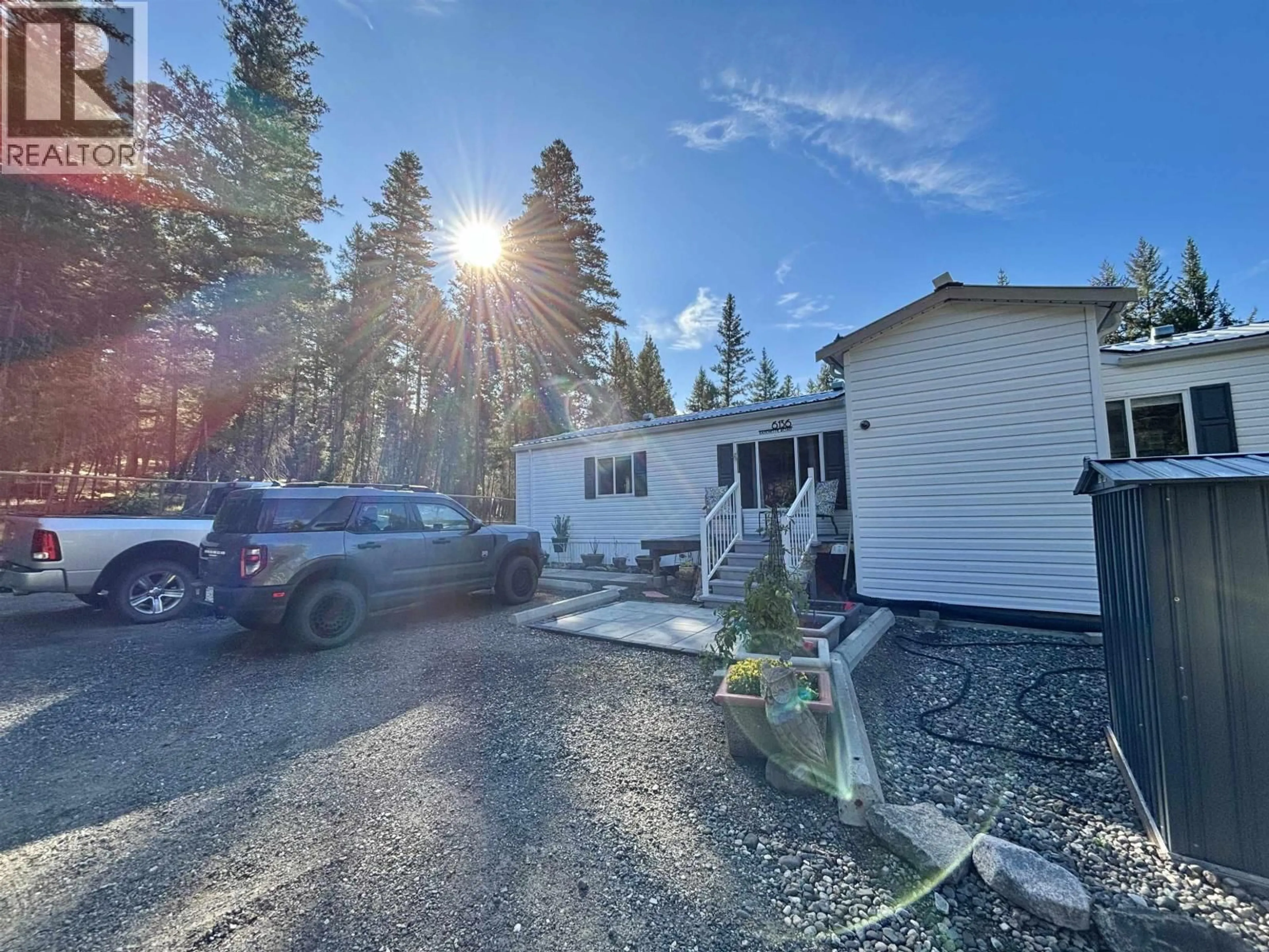 A pic from outside/outdoor area/front of a property/back of a property/a pic from drone, unknown for 6136 RANCHETTE ROAD, 100 Mile House British Columbia V0K2E3