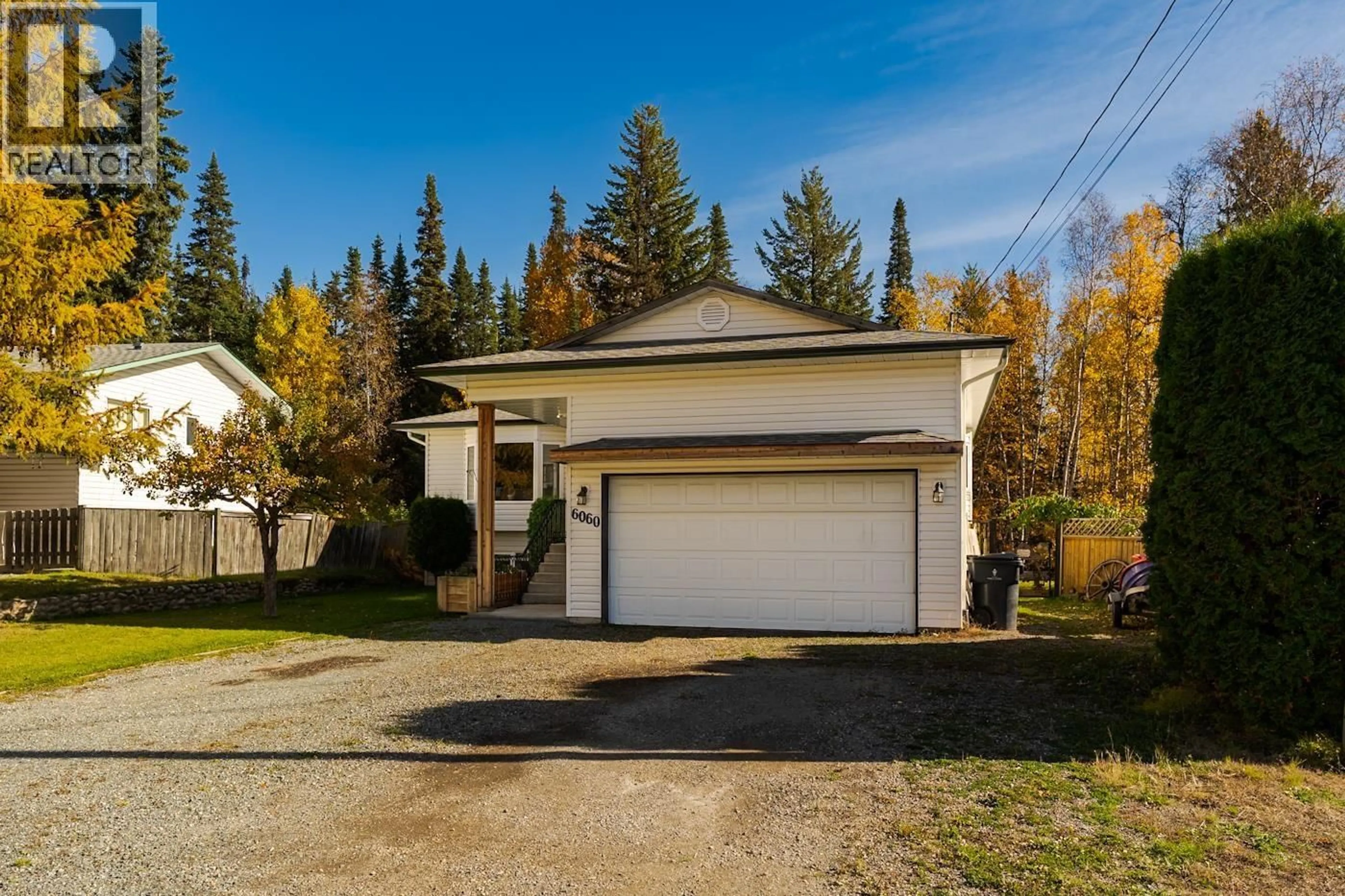 A pic from outside/outdoor area/front of a property/back of a property/a pic from drone, street for 6060 SPRINGALL CRESCENT, Prince George British Columbia V2K4W6