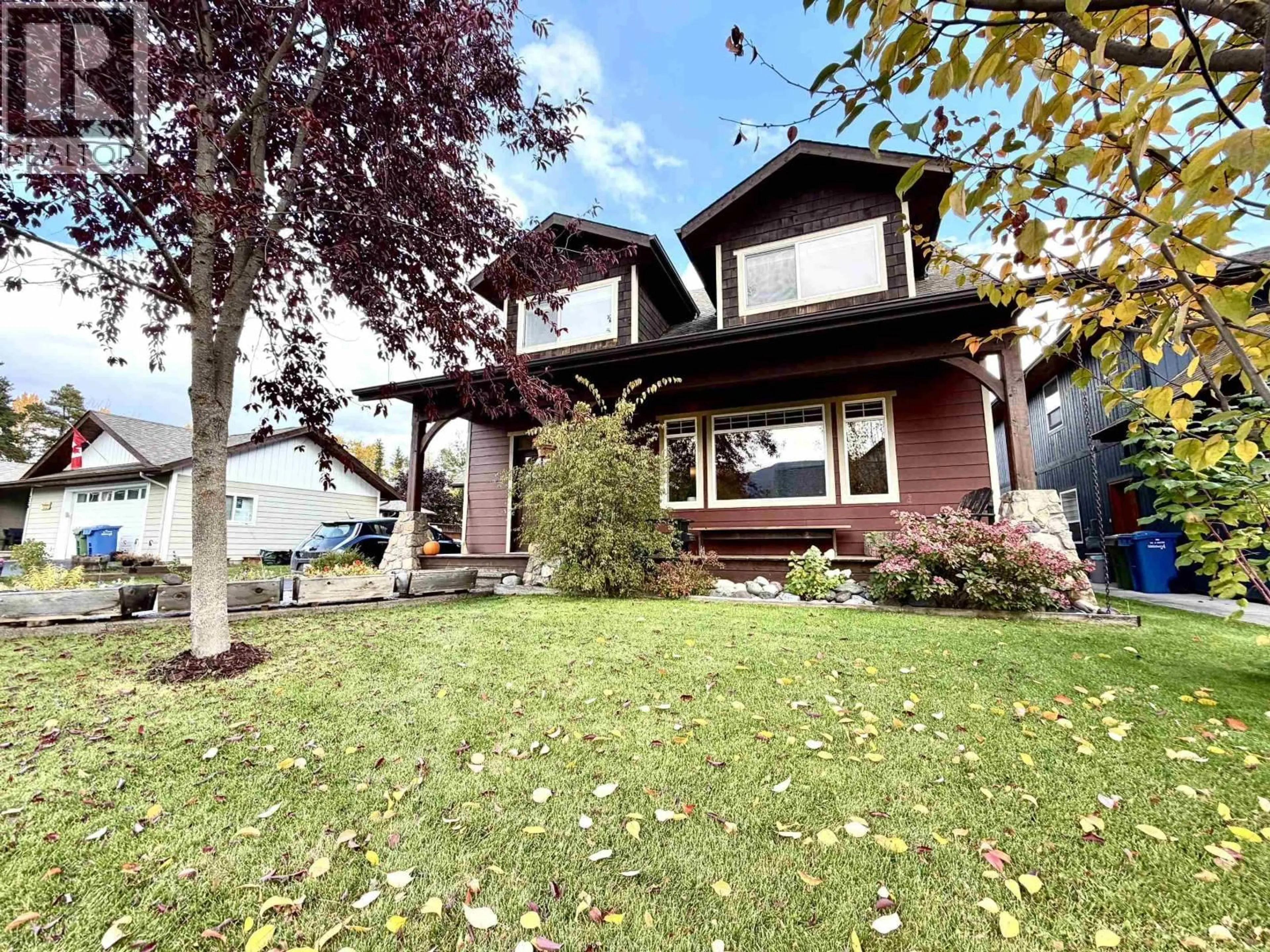 Home with vinyl exterior material, street for 3211 TURNER WAY, Smithers British Columbia V0J2N0