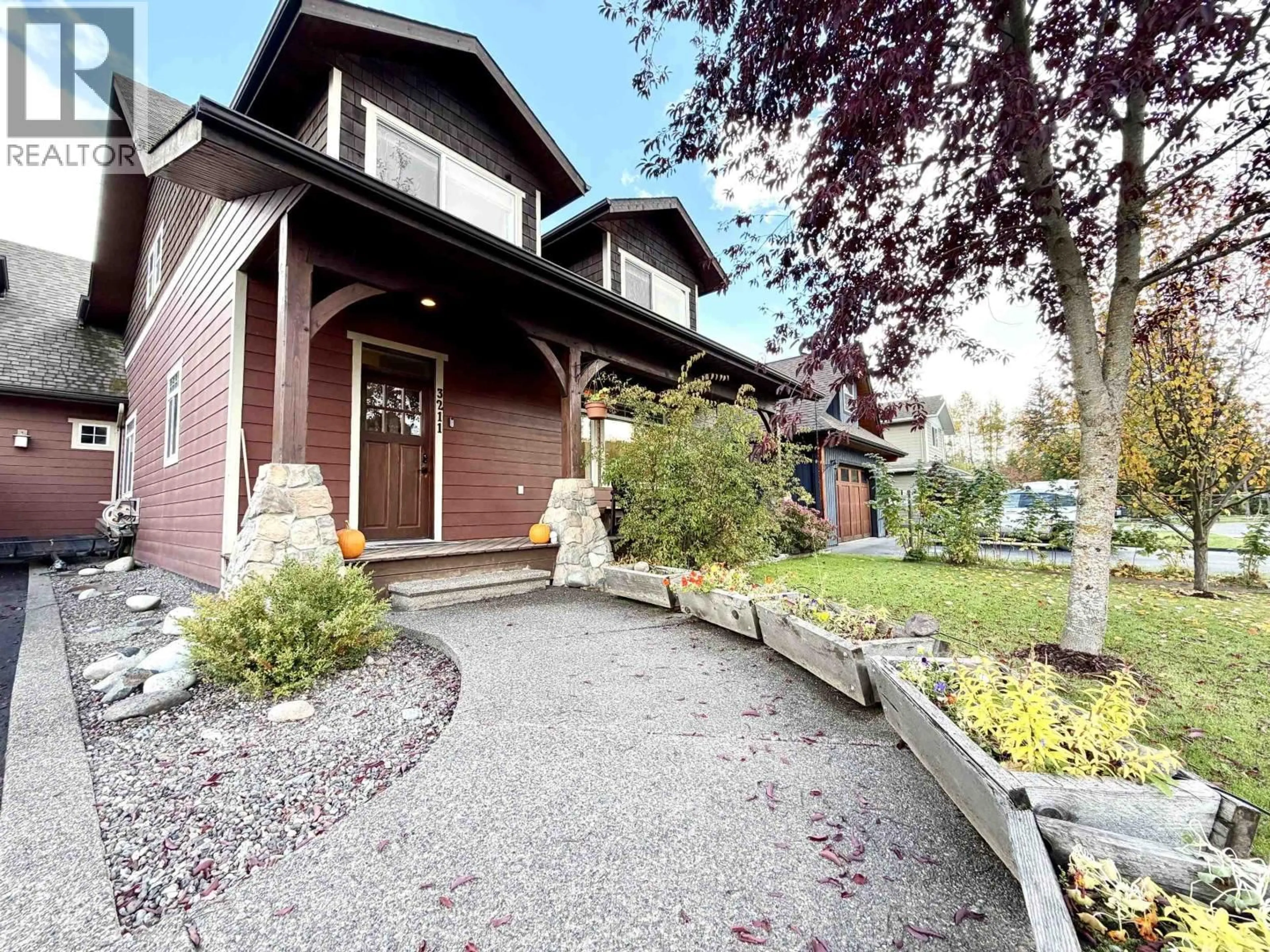 Home with vinyl exterior material, street for 3211 TURNER WAY, Smithers British Columbia V0J2N0