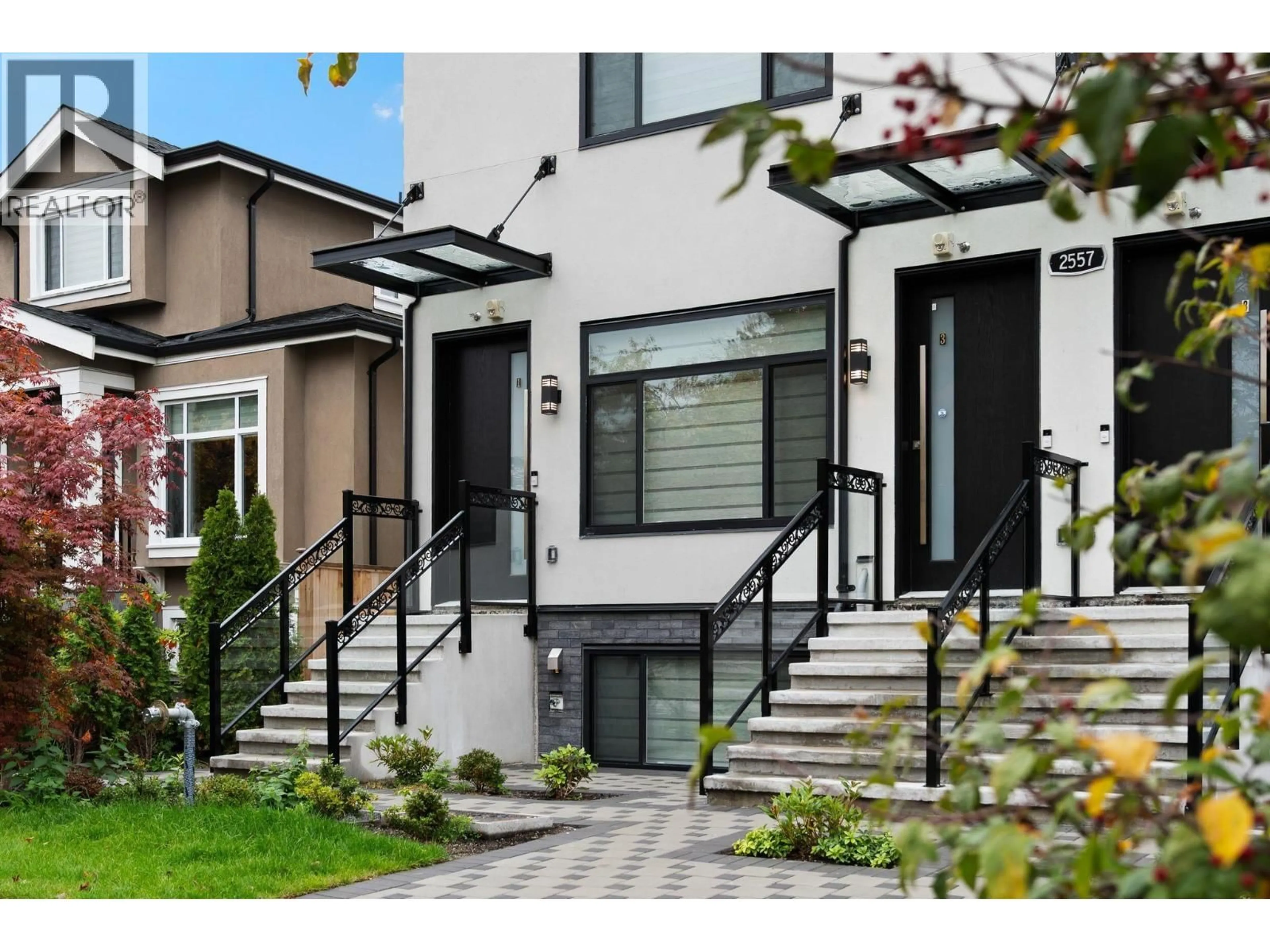 Home with brick exterior material, street for 1 - 2557 KING EDWARD STREET, Vancouver British Columbia V6L1T5