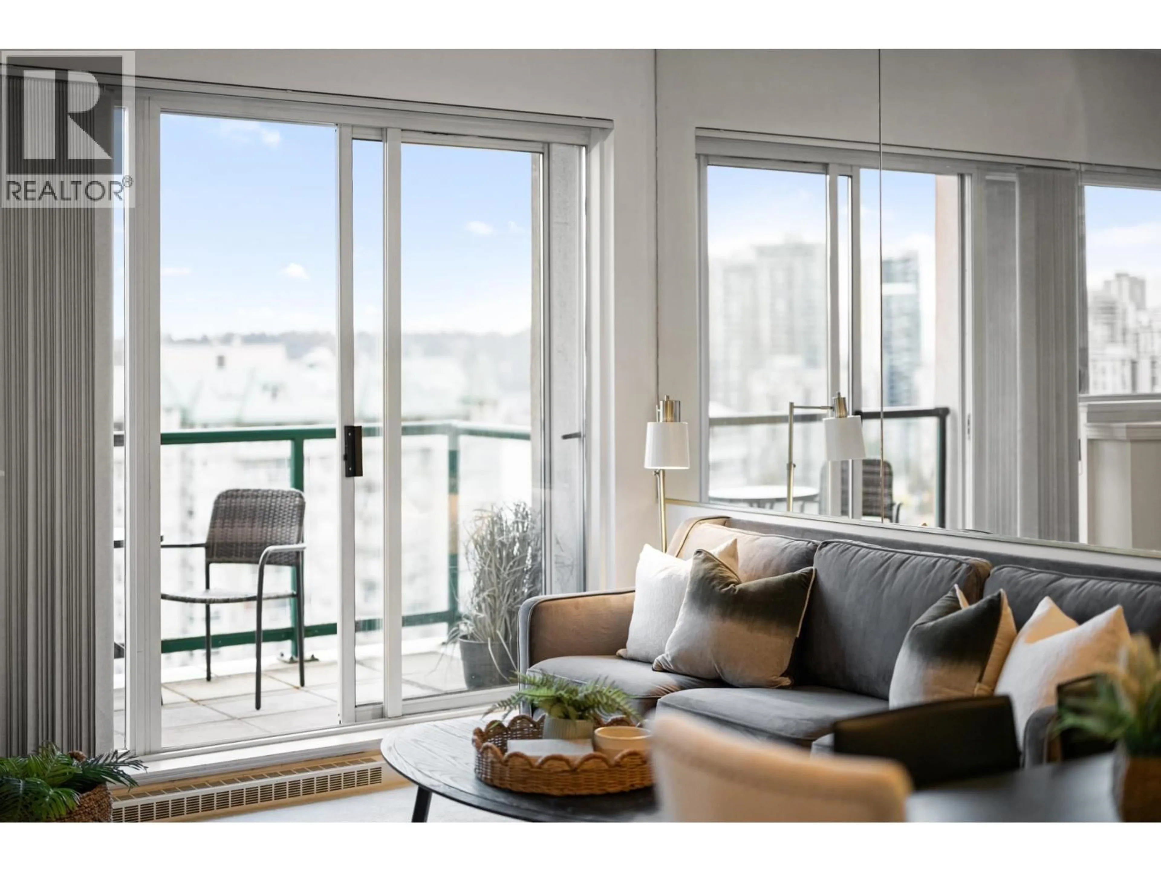 Living room with furniture, wood/laminate floor for 2102 - 10 LAGUNA COURT, New Westminster British Columbia V3M6W3