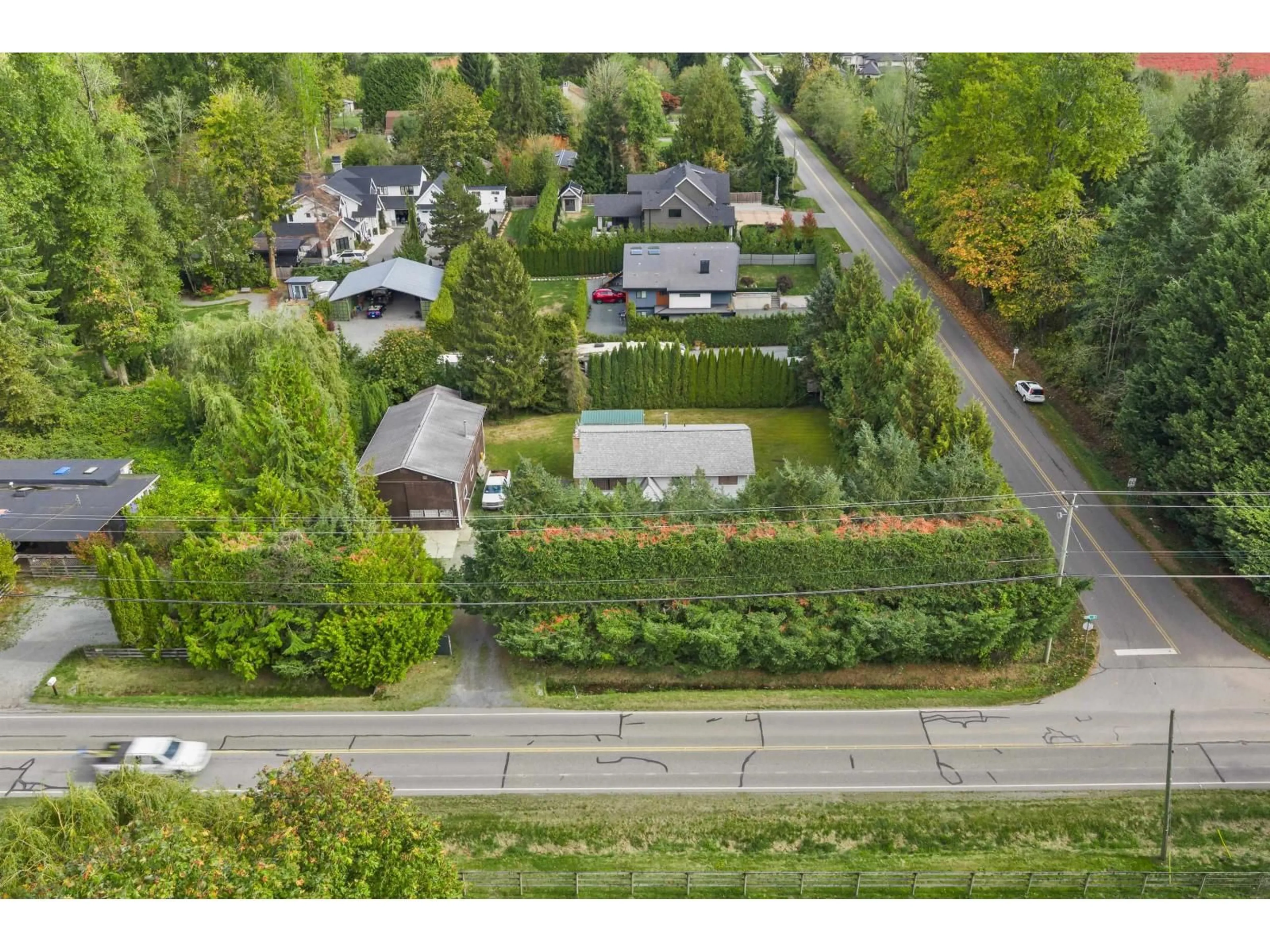 A pic from outside/outdoor area/front of a property/back of a property/a pic from drone, street for 3620 256 STREET, Langley British Columbia V4W2A3