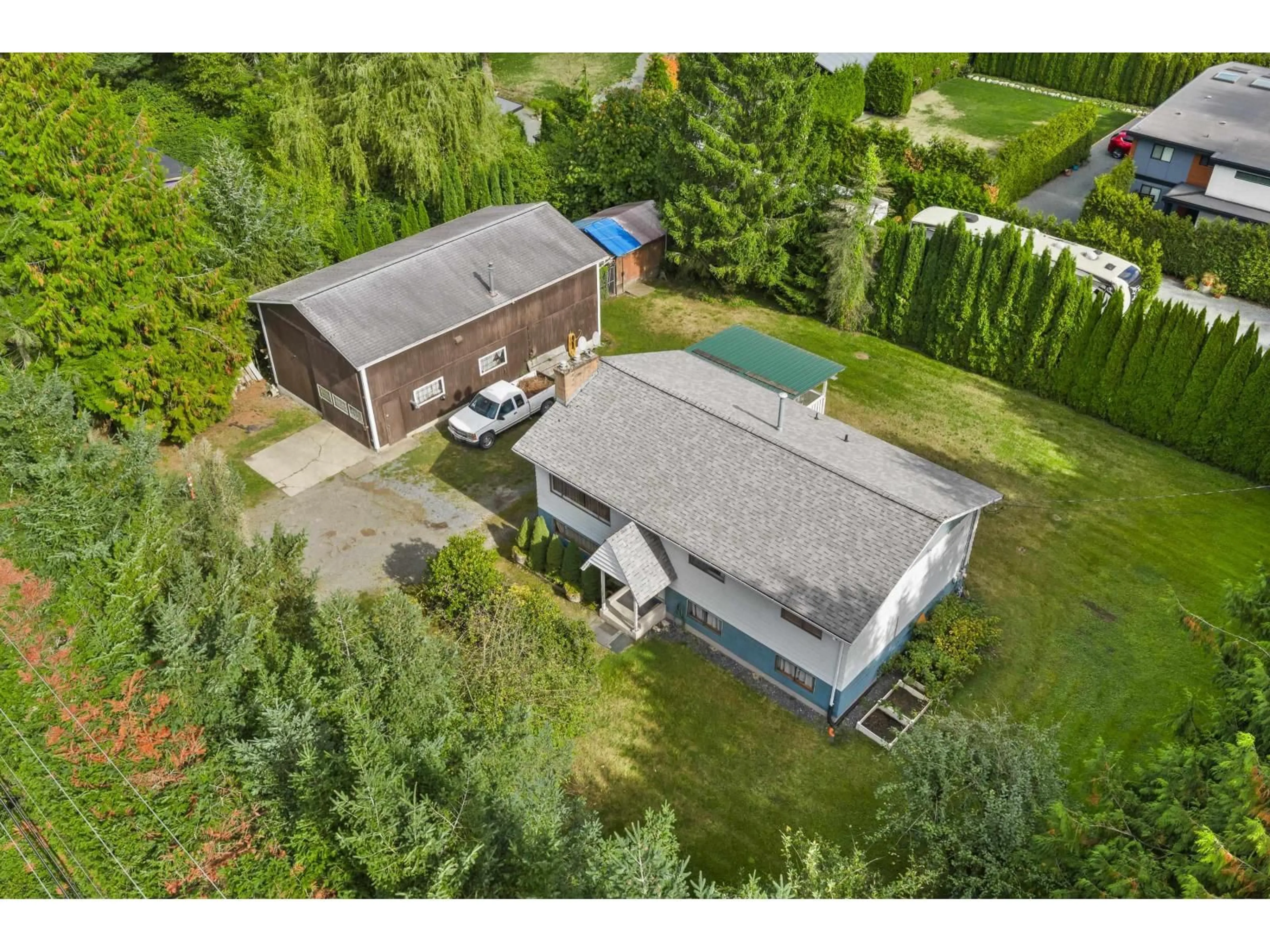 A pic from outside/outdoor area/front of a property/back of a property/a pic from drone, unknown for 3620 256 STREET, Langley British Columbia V4W2A3