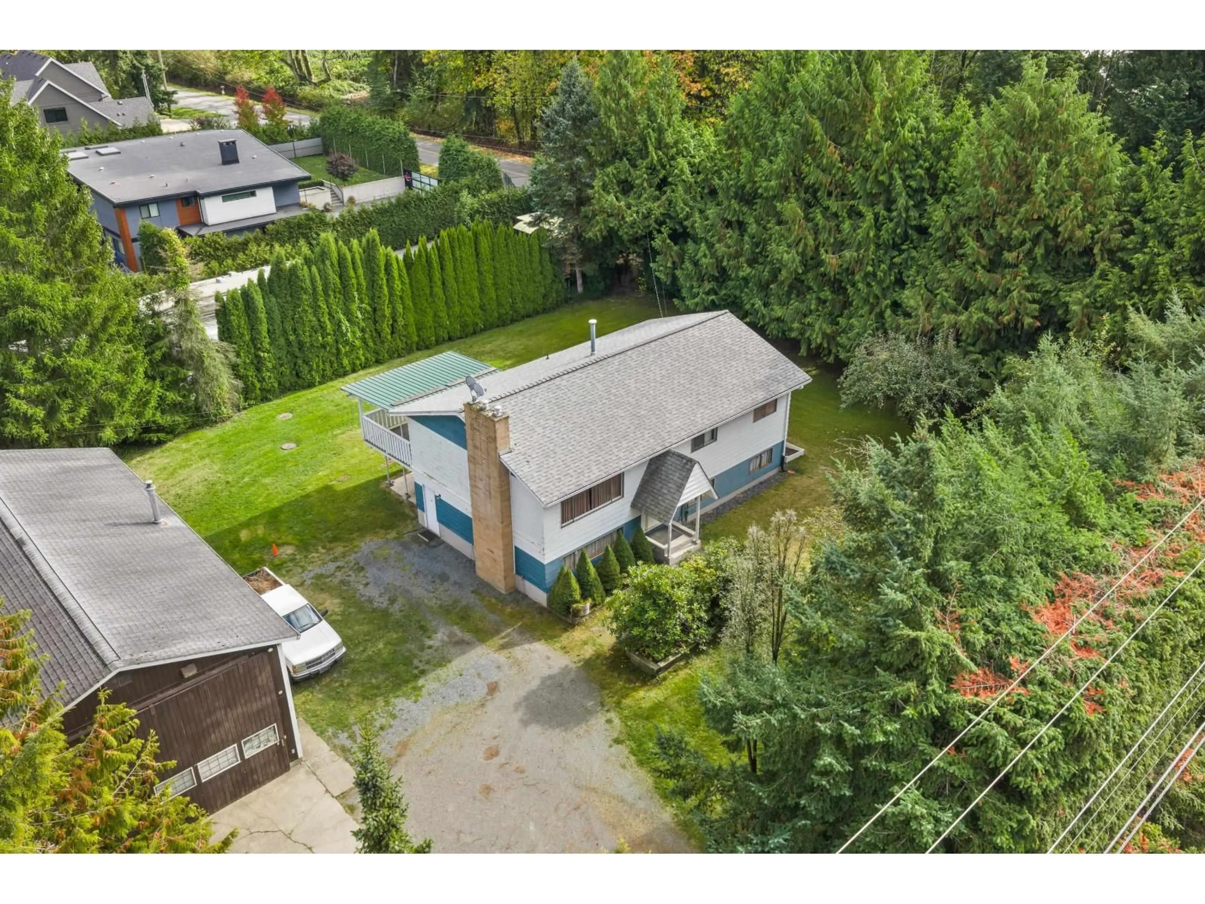 A pic from outside/outdoor area/front of a property/back of a property/a pic from drone, street for 3620 256 STREET, Langley British Columbia V4W2A3