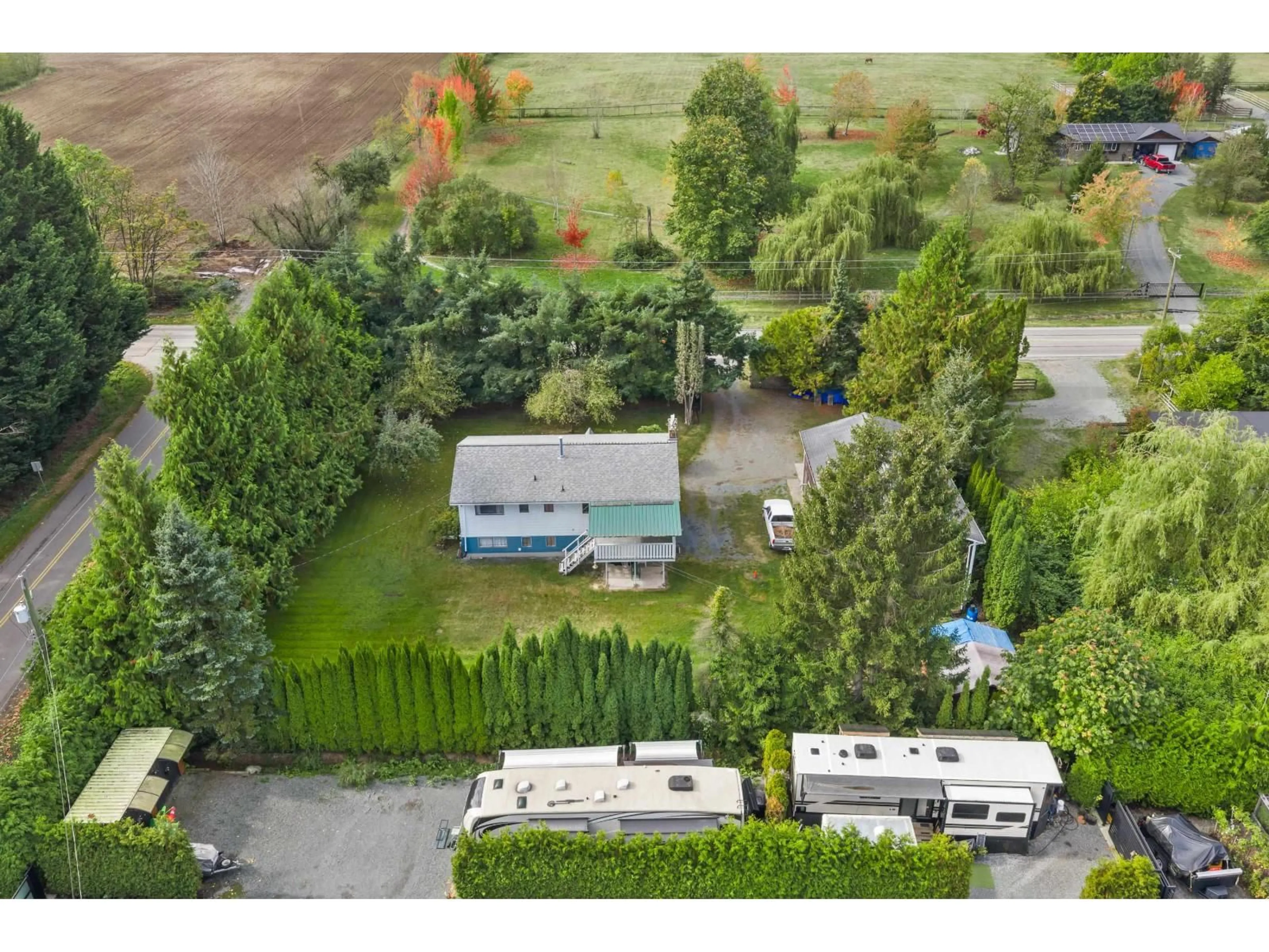 A pic from outside/outdoor area/front of a property/back of a property/a pic from drone, unknown for 3620 256 STREET, Langley British Columbia V4W2A3
