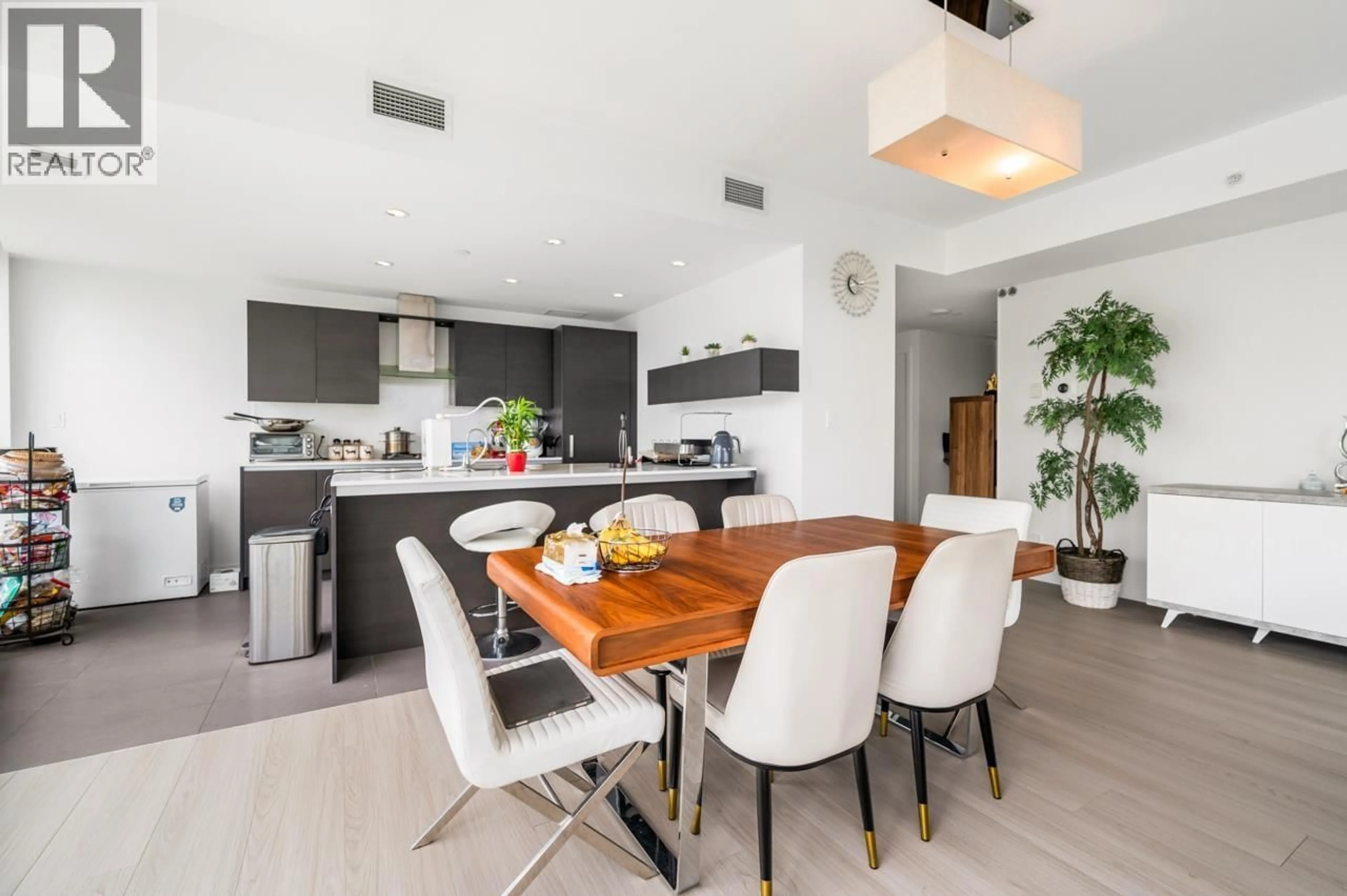 Open concept kitchen, wood/laminate floor for 801 - 5199 BRIGHOUSE WAY, Richmond British Columbia V7C0A7