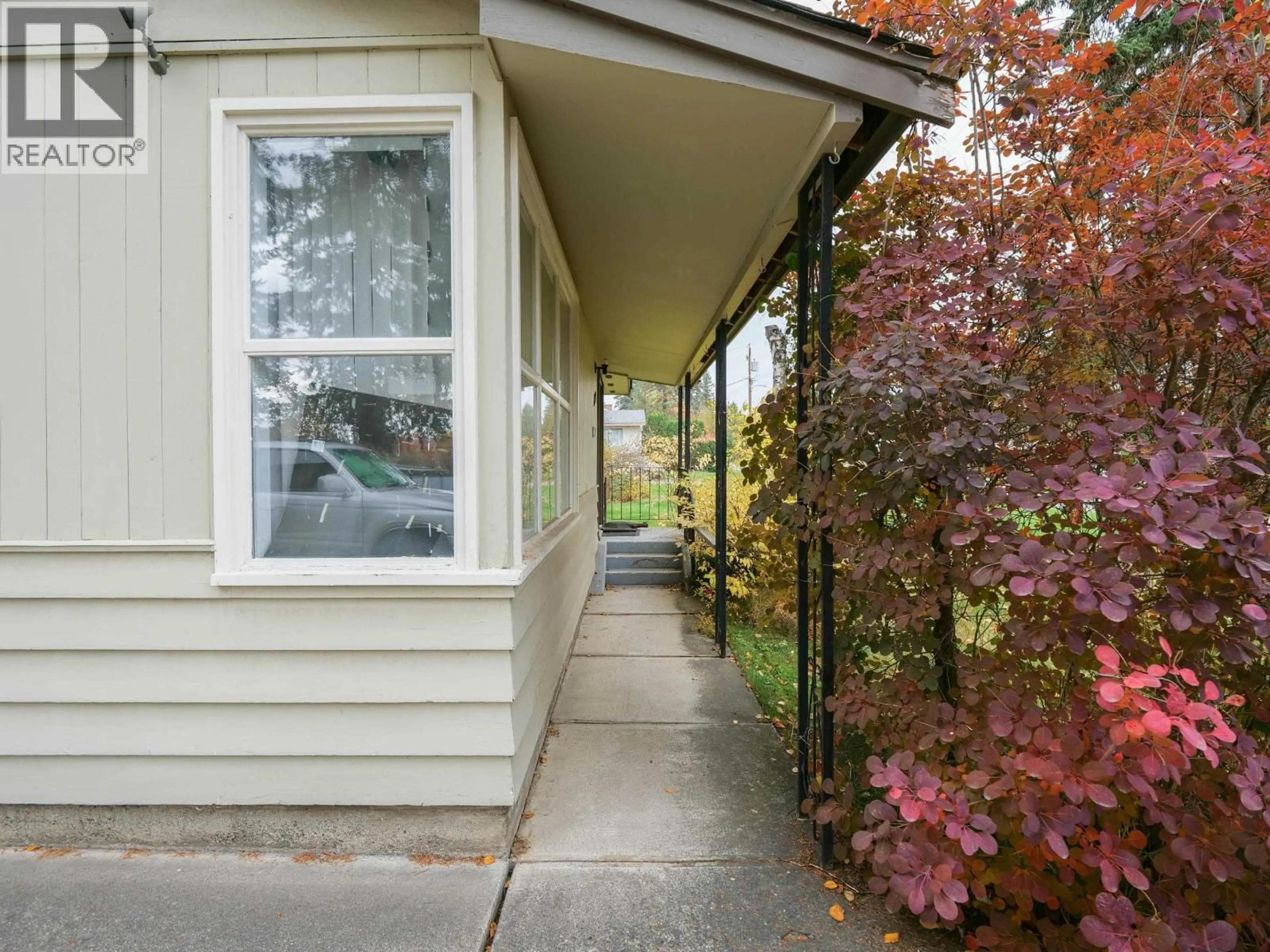 Home with vinyl exterior material, street for 629 WILSON STREET, Quesnel British Columbia V2J2W5