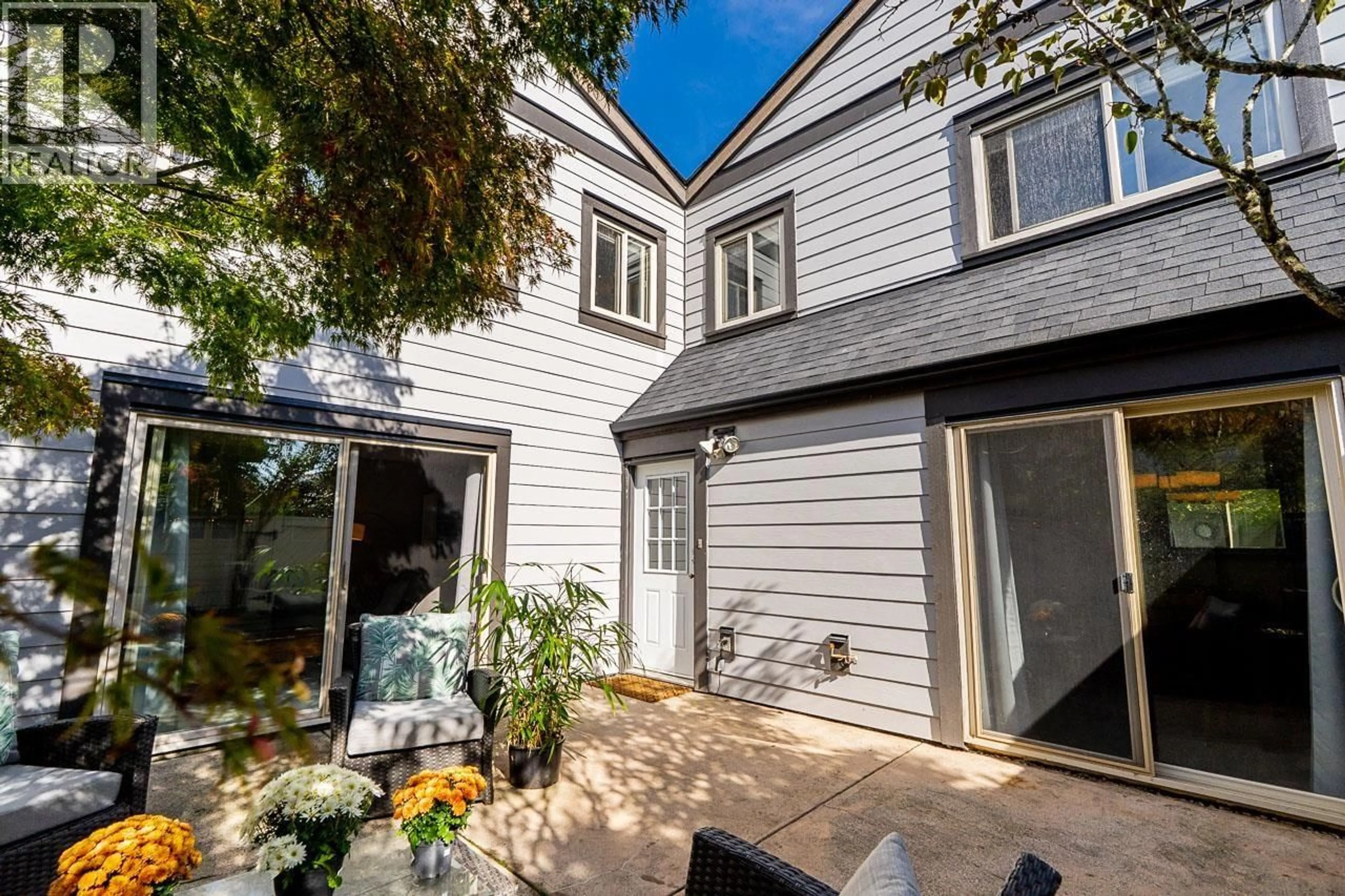 A pic from outside/outdoor area/front of a property/back of a property/a pic from drone, street for 157 - 5421 10 AVENUE, Delta British Columbia V4M3T9