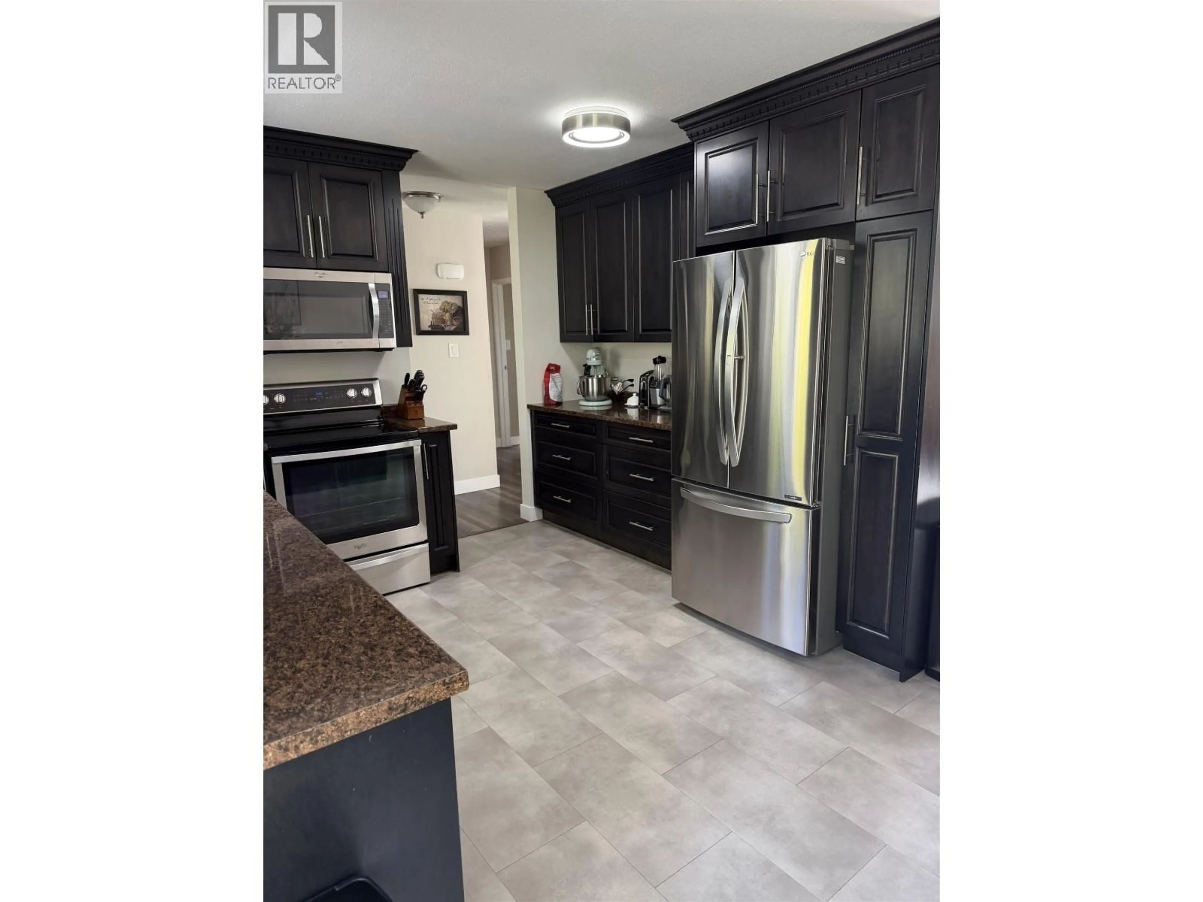 Open concept kitchen, ceramic/tile floor for 10315 16 HIGHWAY, Prince George British Columbia V2N5A6