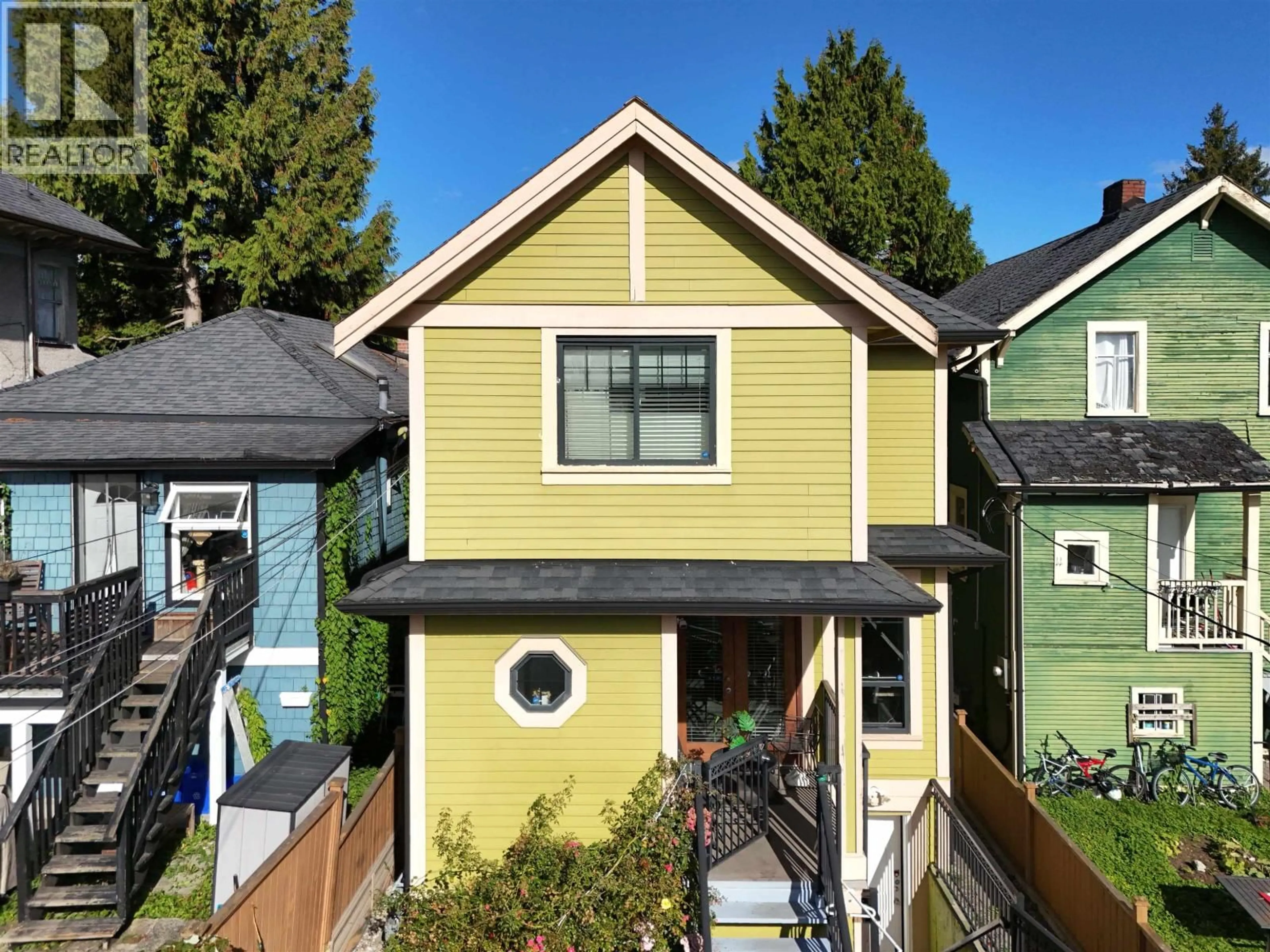 Home with vinyl exterior material, street for 1124 12TH AVENUE, Vancouver British Columbia V5T2J9