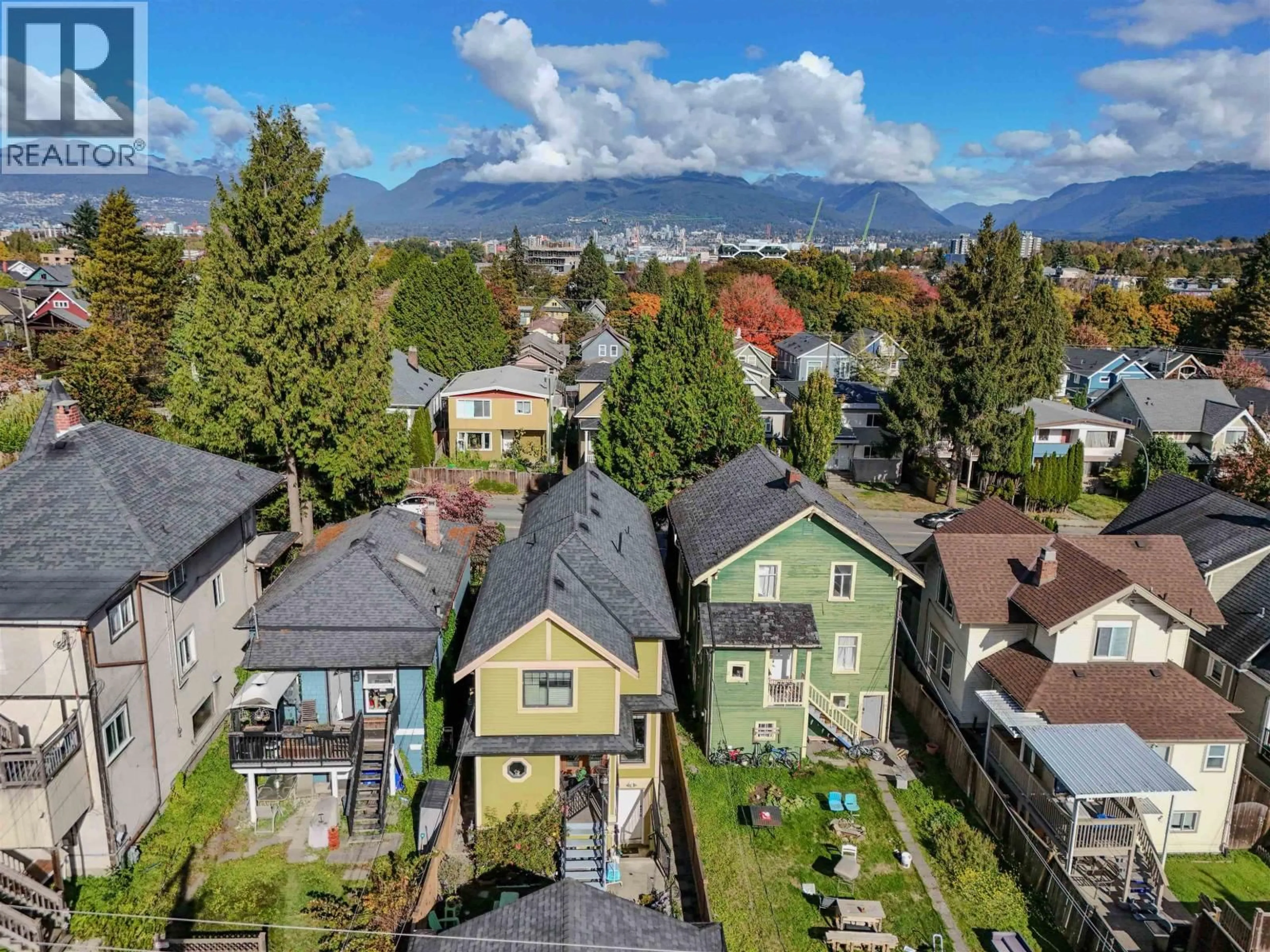 A pic from outside/outdoor area/front of a property/back of a property/a pic from drone, mountain view for 1124 12TH AVENUE, Vancouver British Columbia V5T2J9