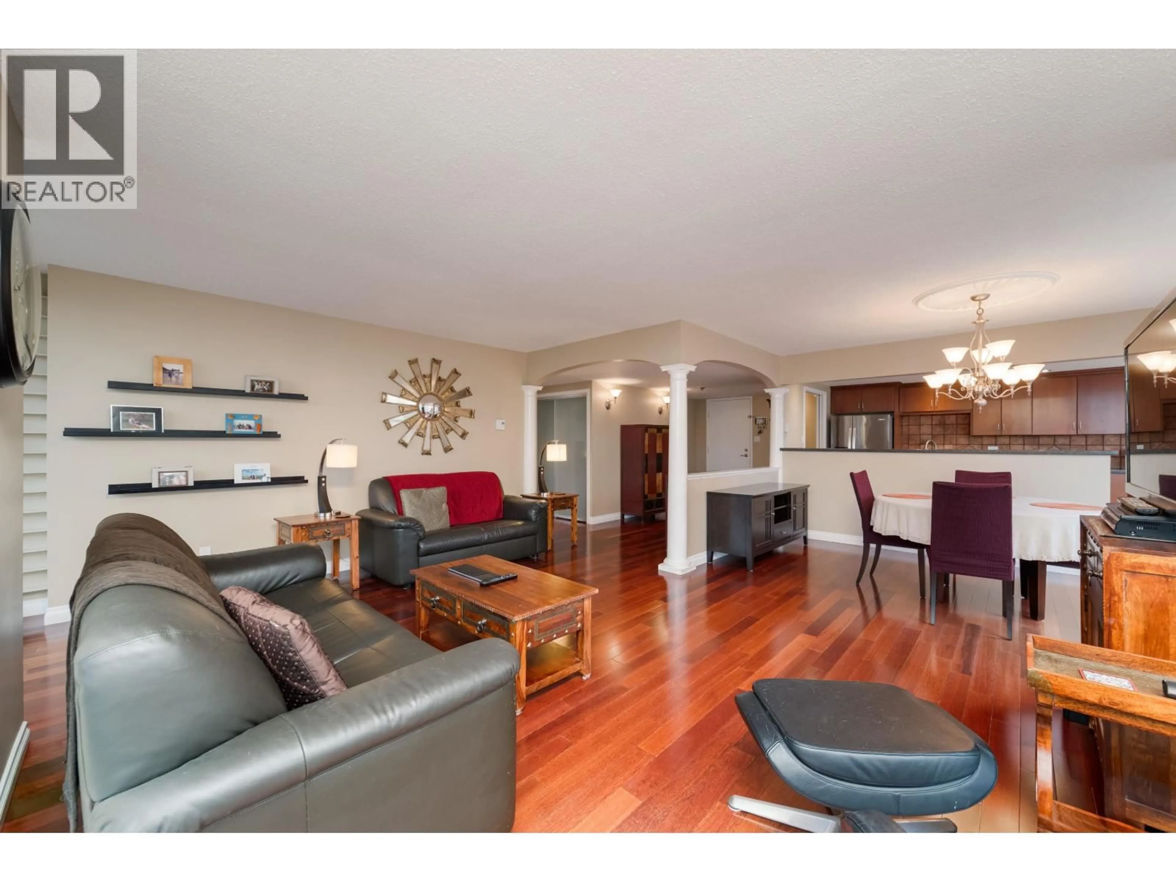Living room with furniture, wood/laminate floor for 1801 - 717 JERVIS STREET, Vancouver British Columbia V6E4L5