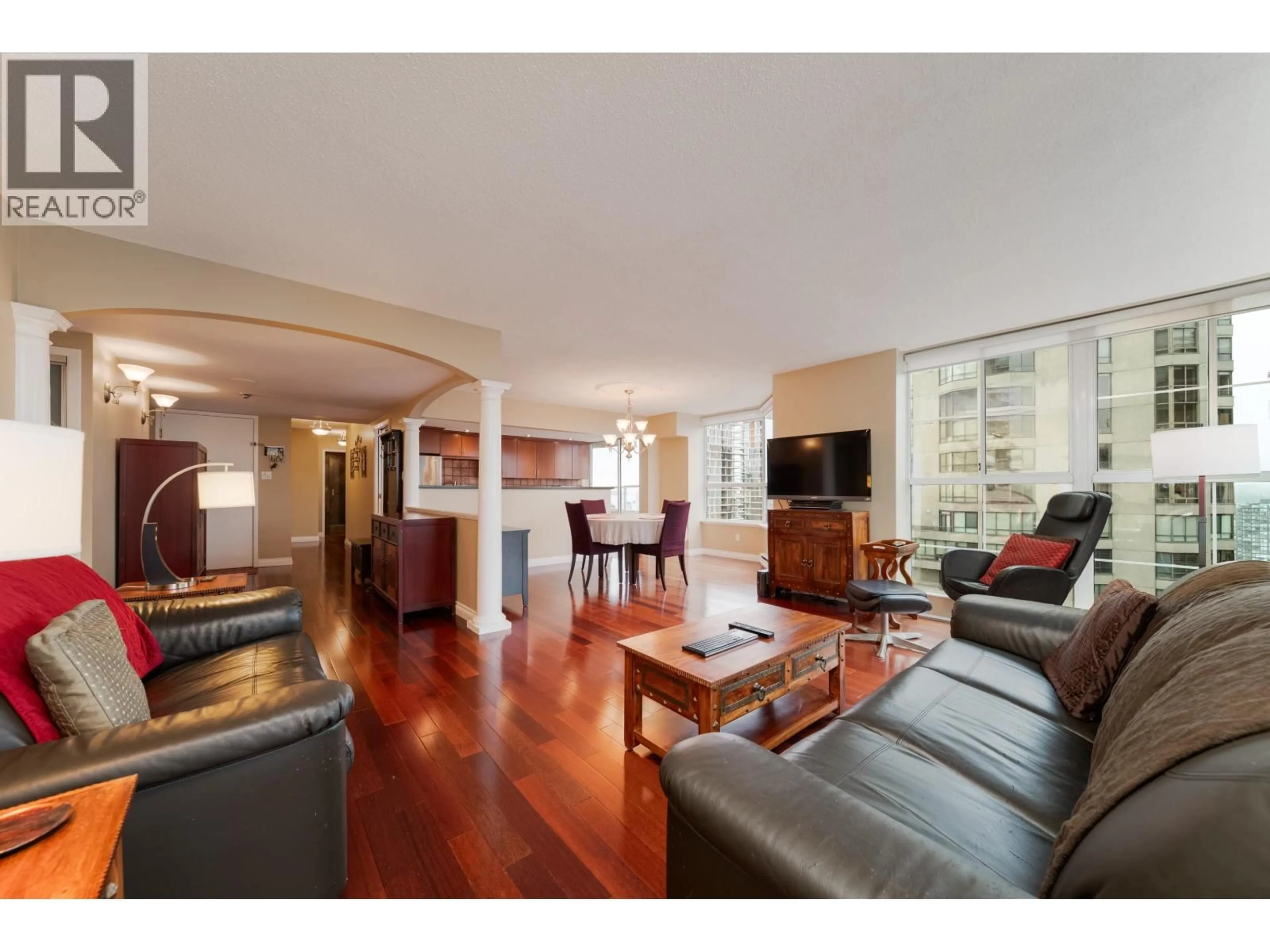 Living room with furniture, wood/laminate floor for 1801 - 717 JERVIS STREET, Vancouver British Columbia V6E4L5