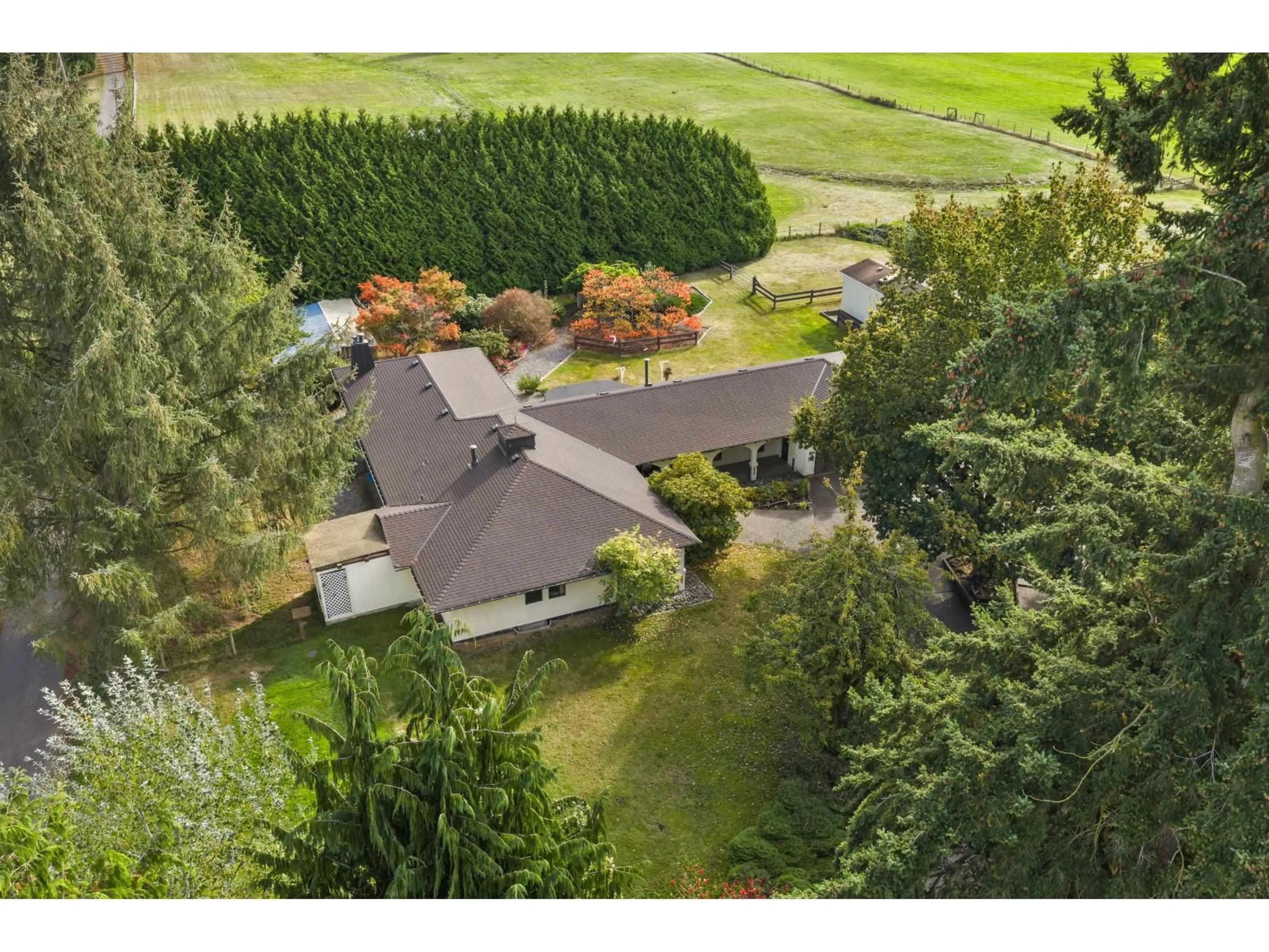 A pic from outside/outdoor area/front of a property/back of a property/a pic from drone, unknown for 1240 224 STREET, Langley British Columbia V2Z2W7