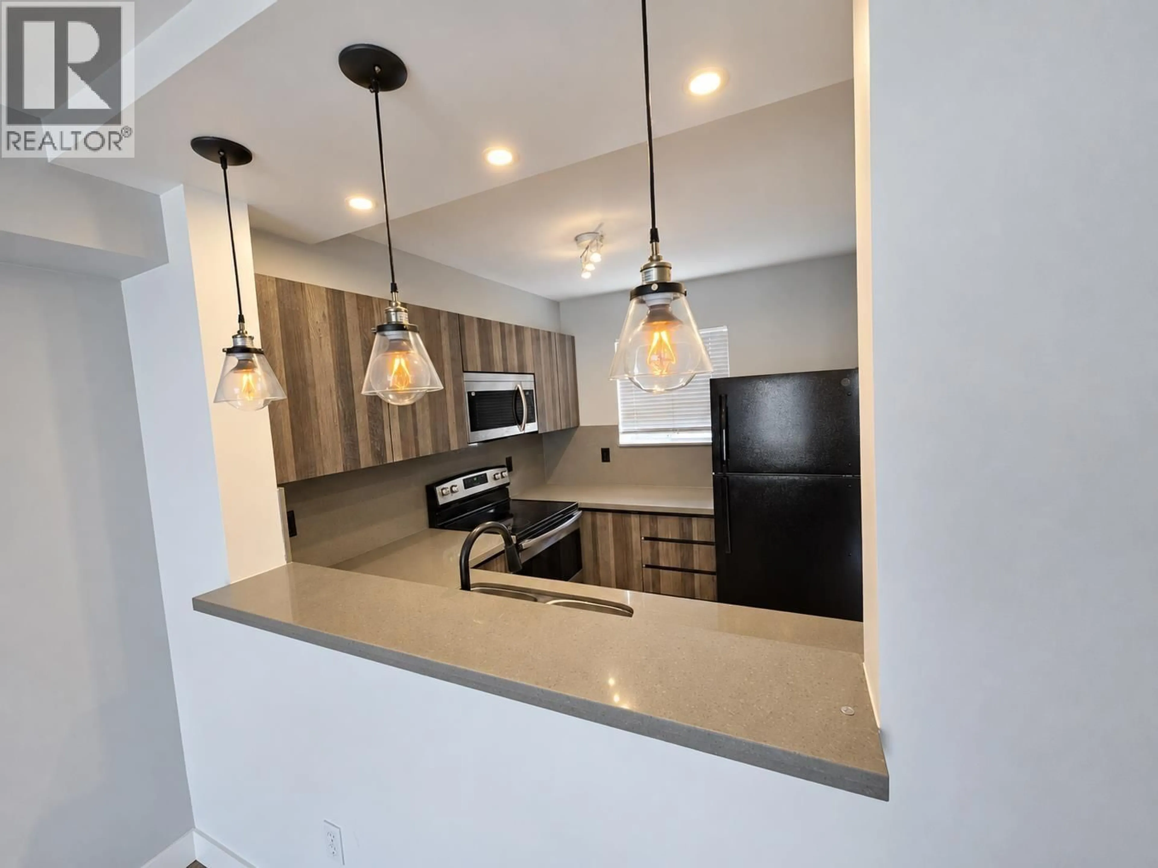 Open concept kitchen, unknown for 204 - 2211 NO. 4 ROAD, Richmond British Columbia V6X3X1