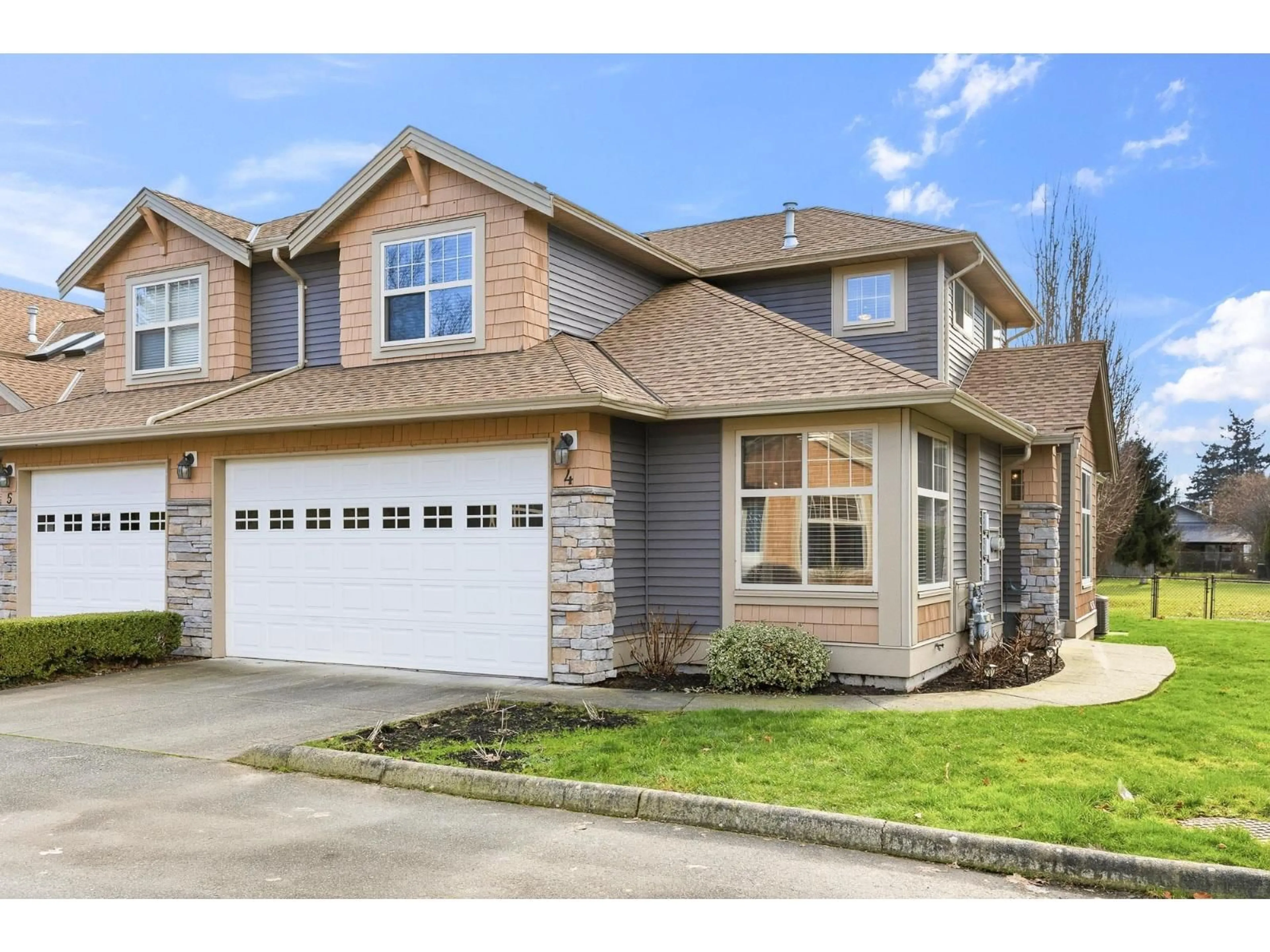 Home with vinyl exterior material, street for 4 - 46150 RIVERSIDE DRIVE, Chilliwack British Columbia V2P3K9