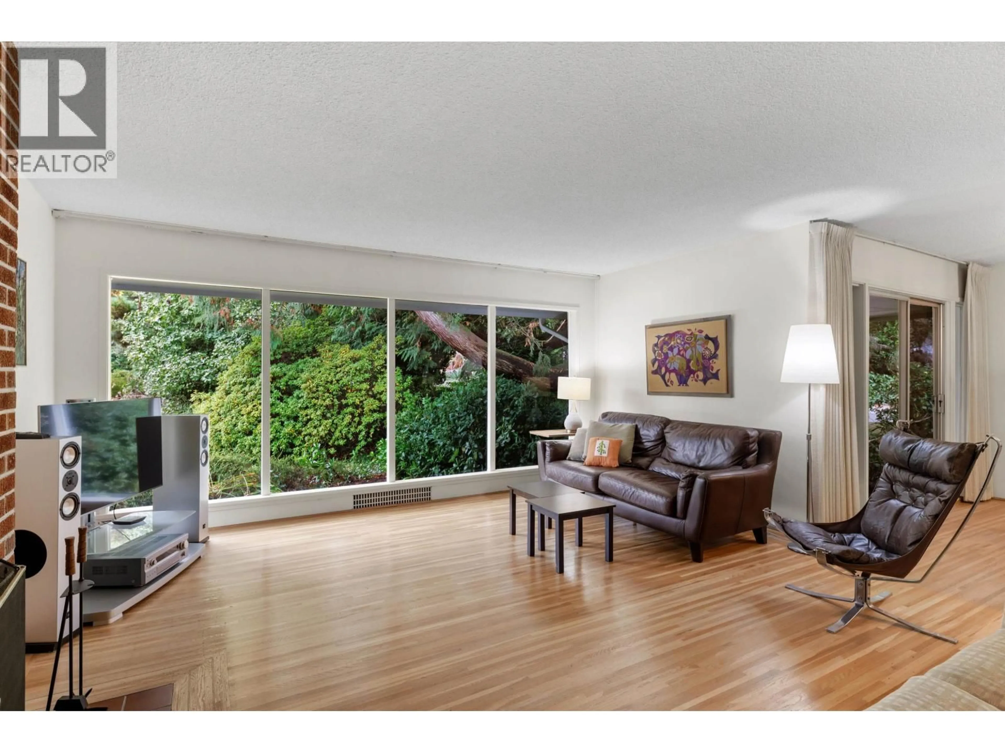Living room with furniture, wood/laminate floor for 3692 SUNNYCREST DRIVE, North Vancouver British Columbia V7R3C6