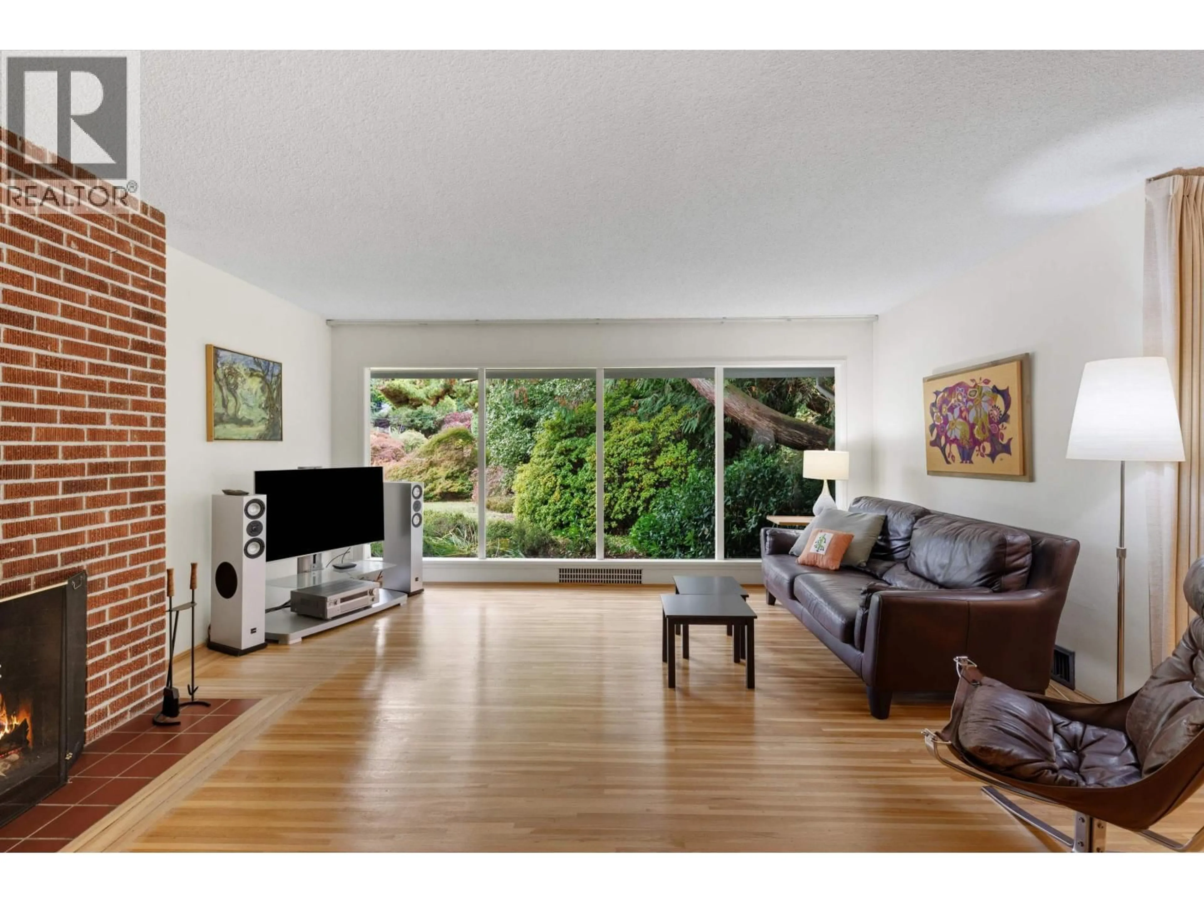 Living room with furniture, wood/laminate floor for 3692 SUNNYCREST DRIVE, North Vancouver British Columbia V7R3C6