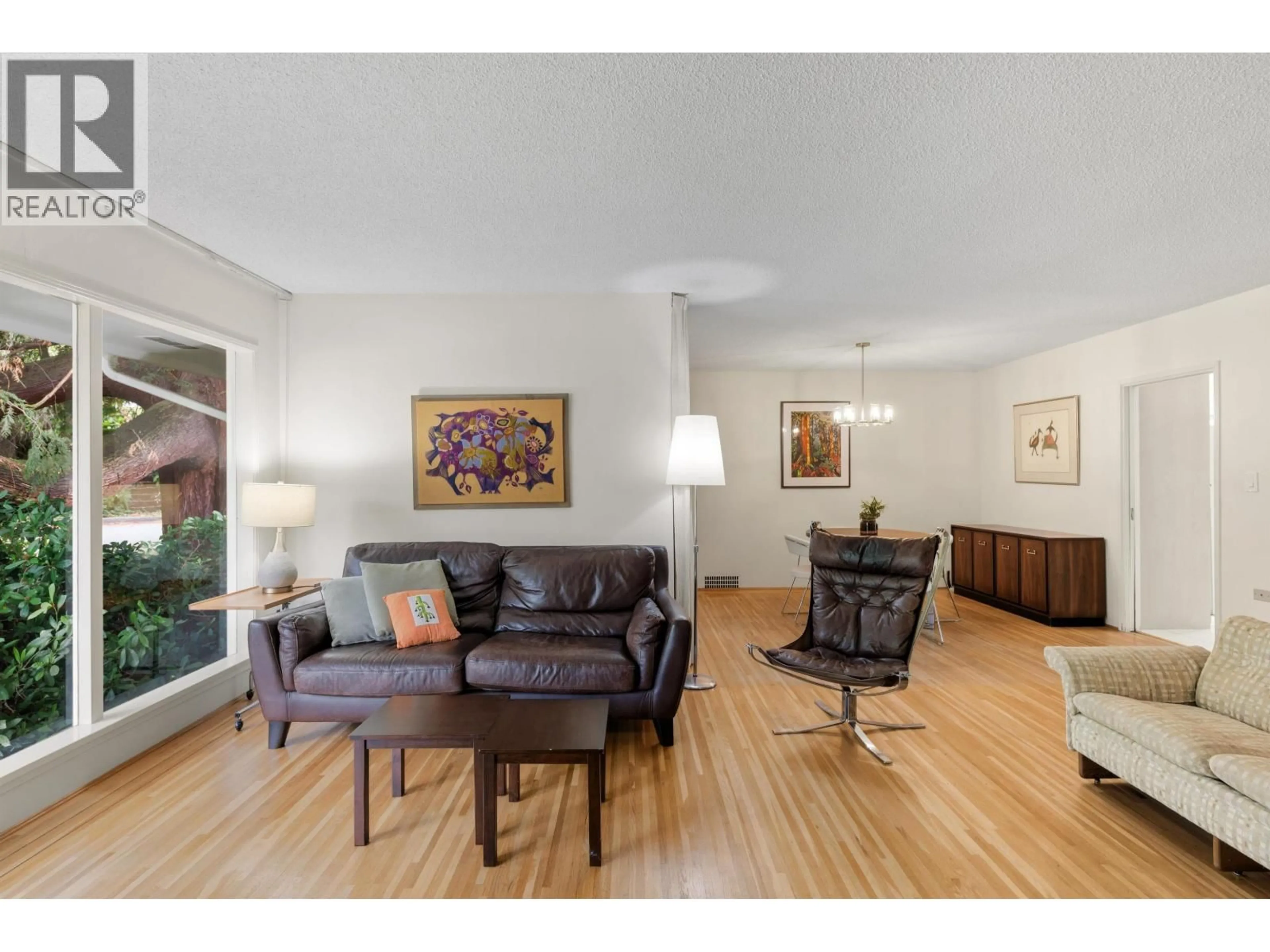 Living room with furniture, wood/laminate floor for 3692 SUNNYCREST DRIVE, North Vancouver British Columbia V7R3C6