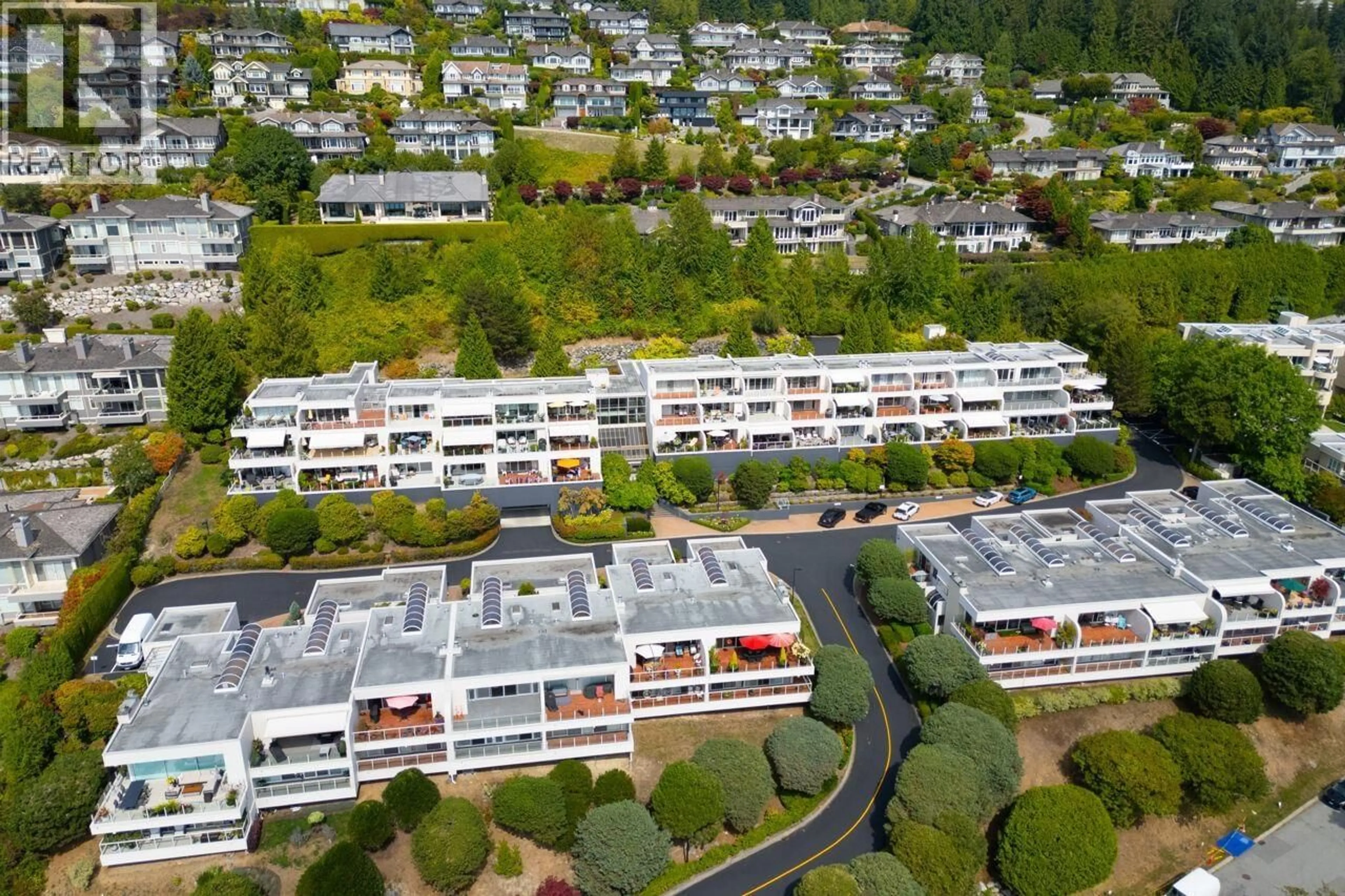 A pic from outside/outdoor area/front of a property/back of a property/a pic from drone, unknown for 210 - 2274 FOLKESTONE WAY, West Vancouver British Columbia V7S2X7