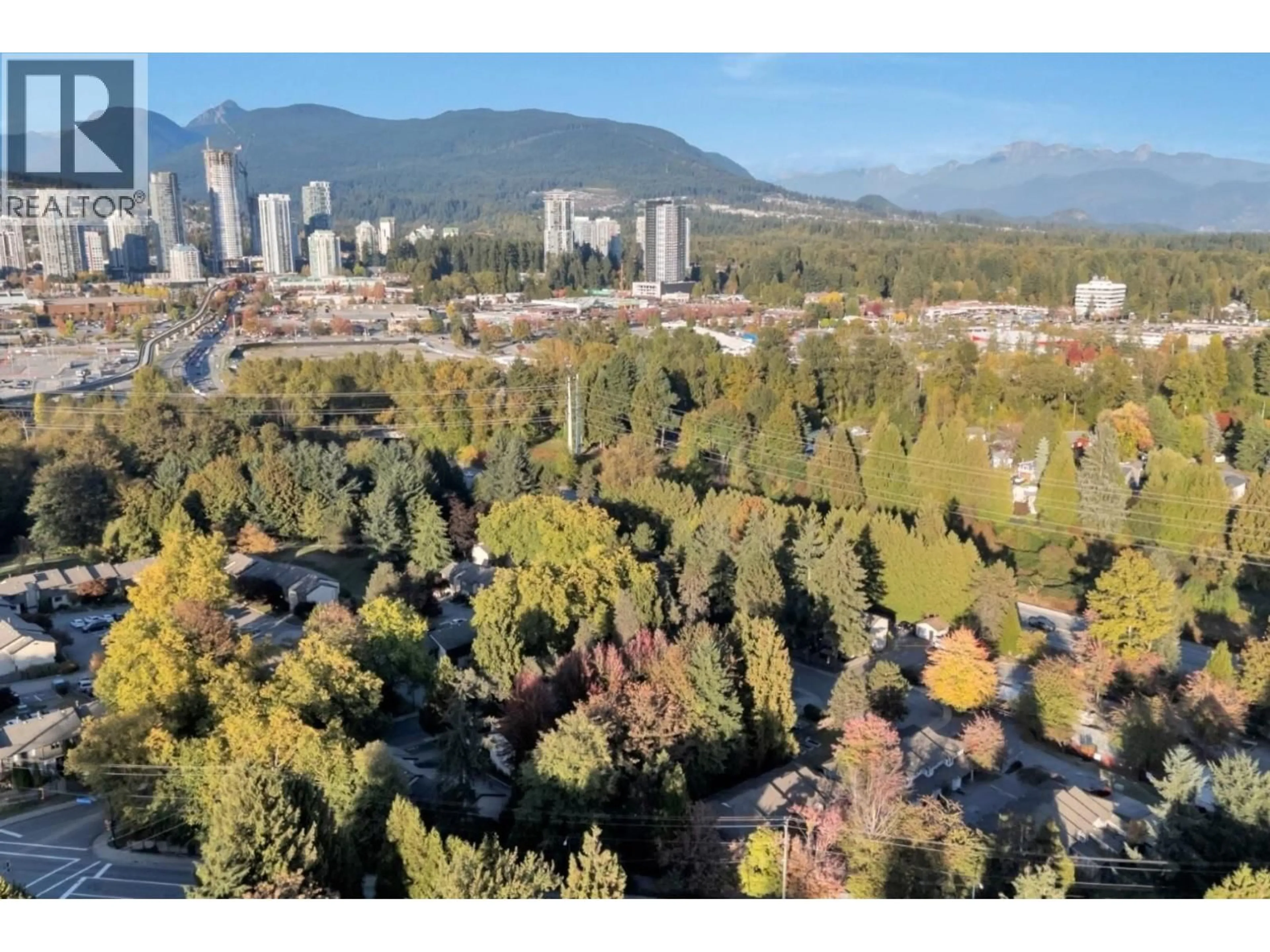 A pic from outside/outdoor area/front of a property/back of a property/a pic from drone, mountain view for 102 - 2915 NORMAN AVENUE, Coquitlam British Columbia V3C4H8