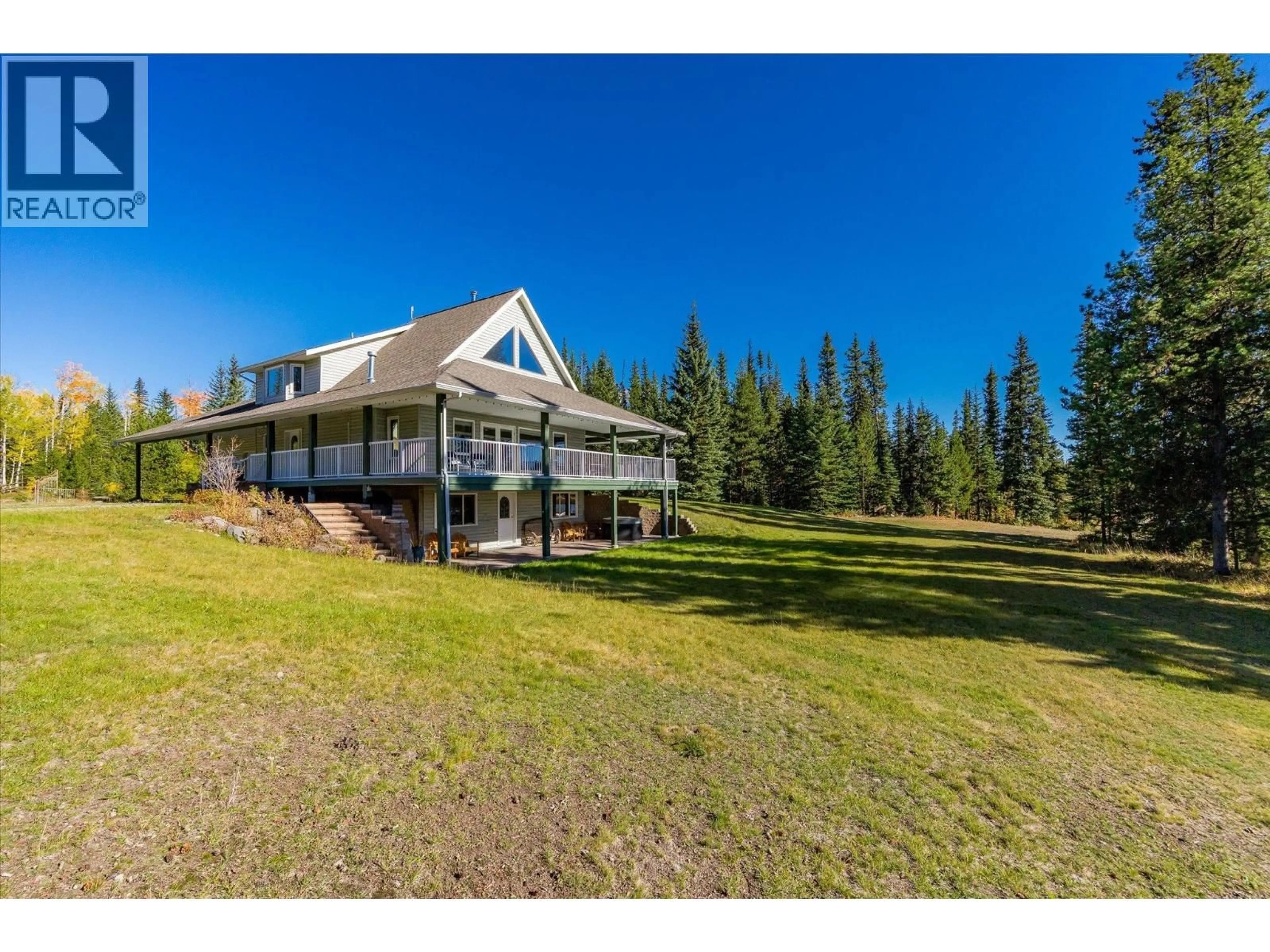 A pic from outside/outdoor area/front of a property/back of a property/a pic from drone, mountain view for 6782 EDMUNDS LAKE ROAD, 100 Mile House British Columbia V0K2E2