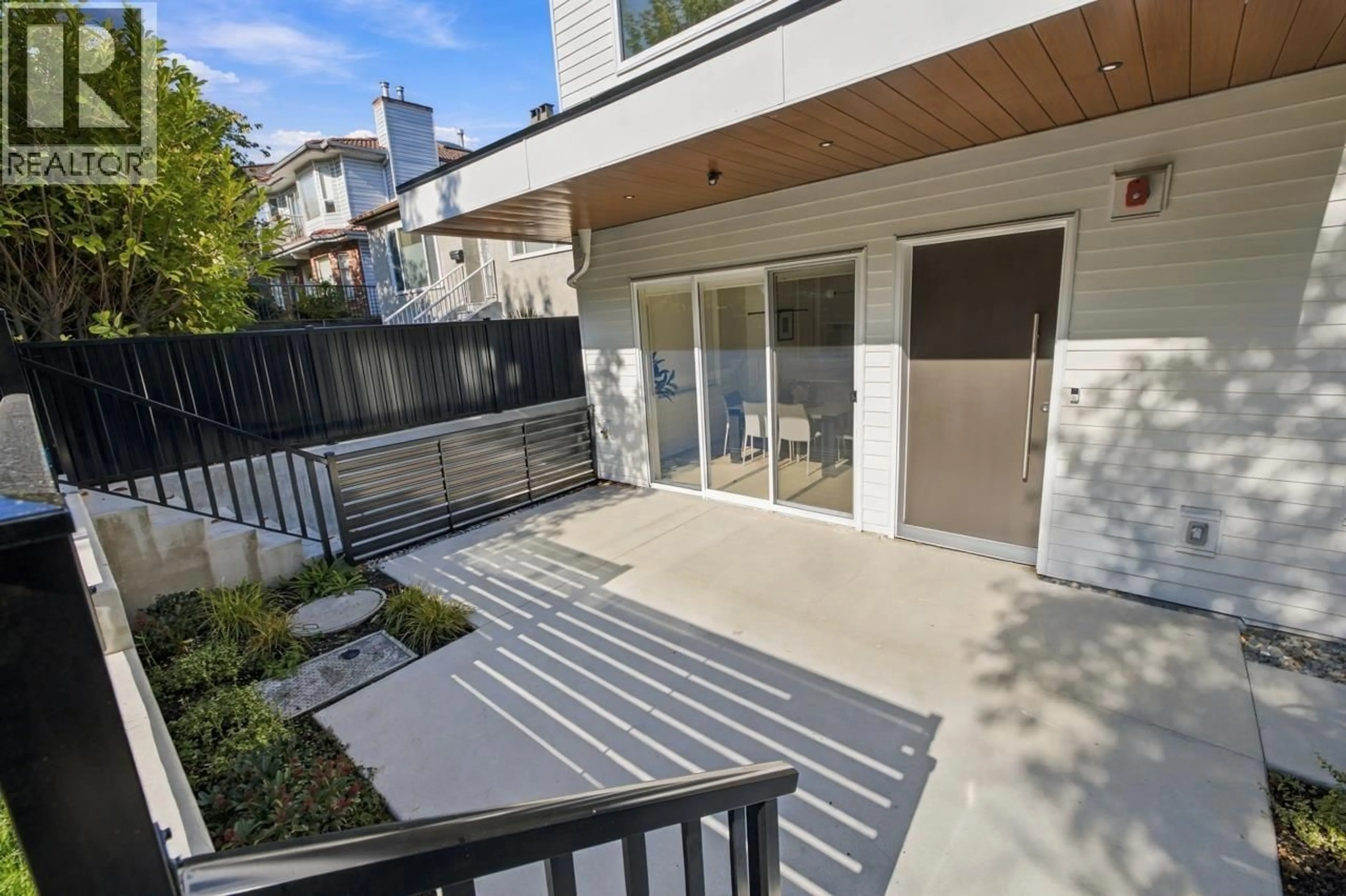 Patio, street for 1 - 3185 GRAVELEY STREET, Vancouver British Columbia V5K3K7