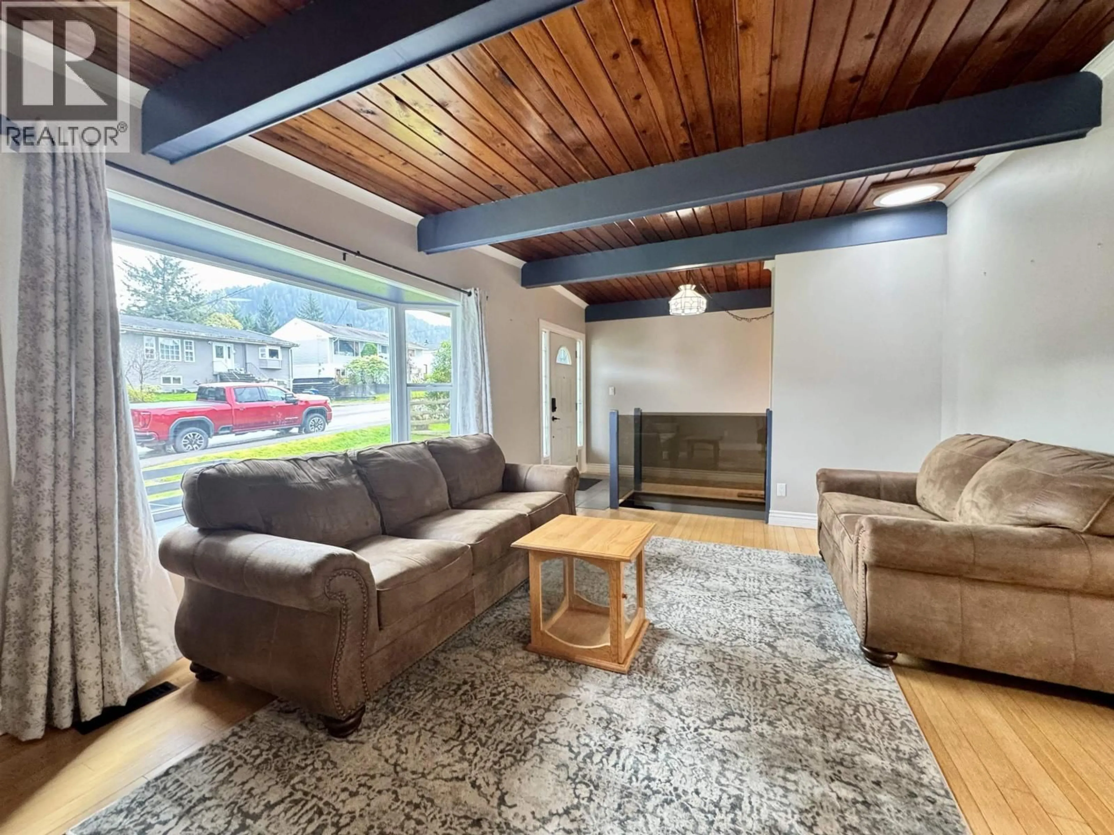 Living room with furniture, wood/laminate floor for 1549 INDIA AVENUE, Prince Rupert British Columbia V8J2Y1