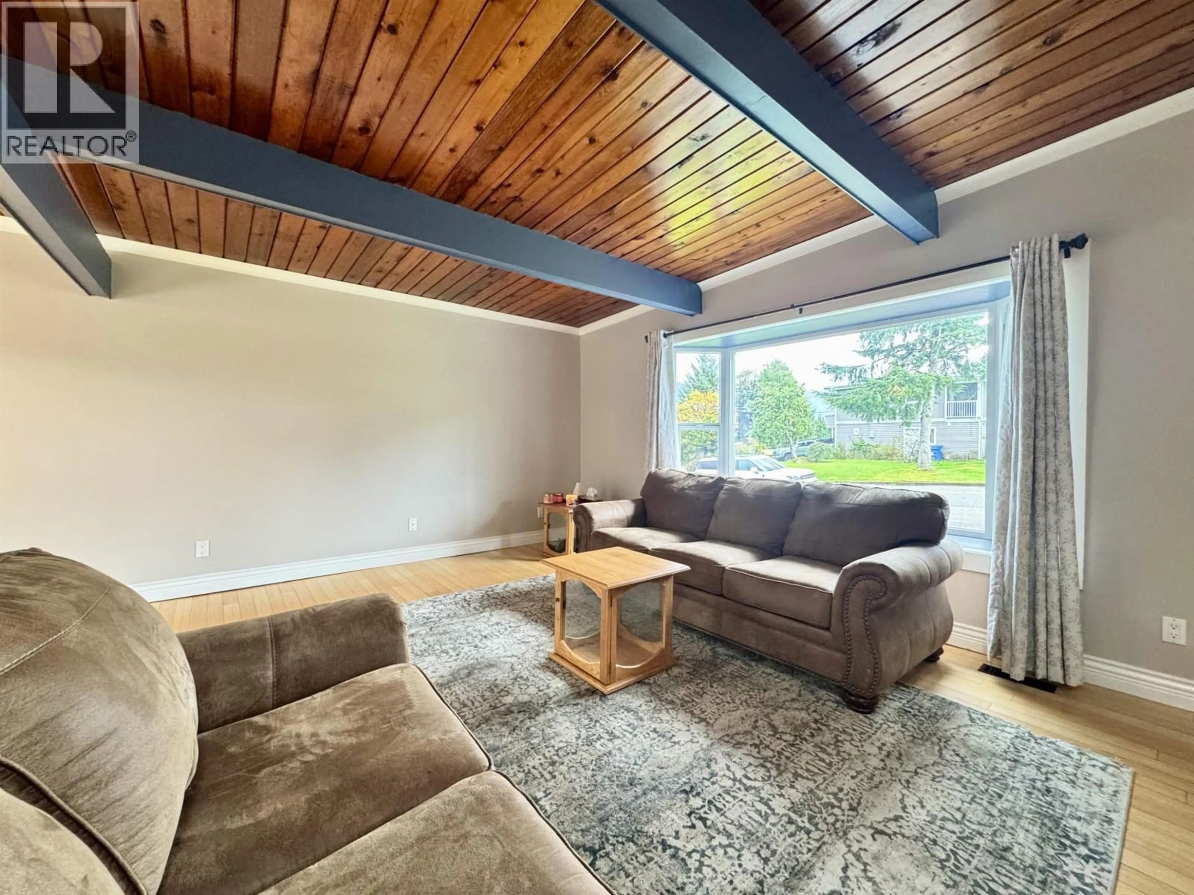 Living room with furniture, wood/laminate floor for 1549 INDIA AVENUE, Prince Rupert British Columbia V8J2Y1
