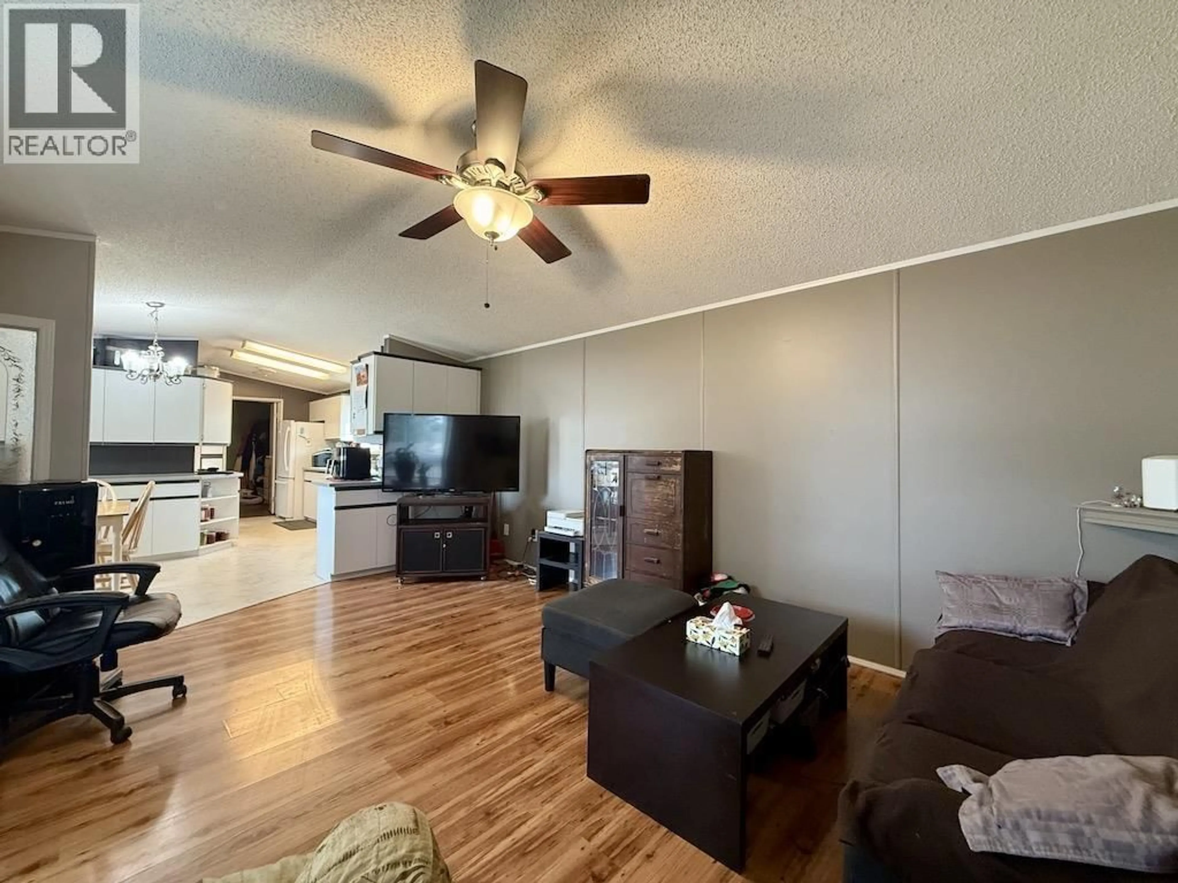 Living room with furniture, wood/laminate floor for 23 - 8420 ALASKA ROAD, Fort St. John British Columbia V1J4J6