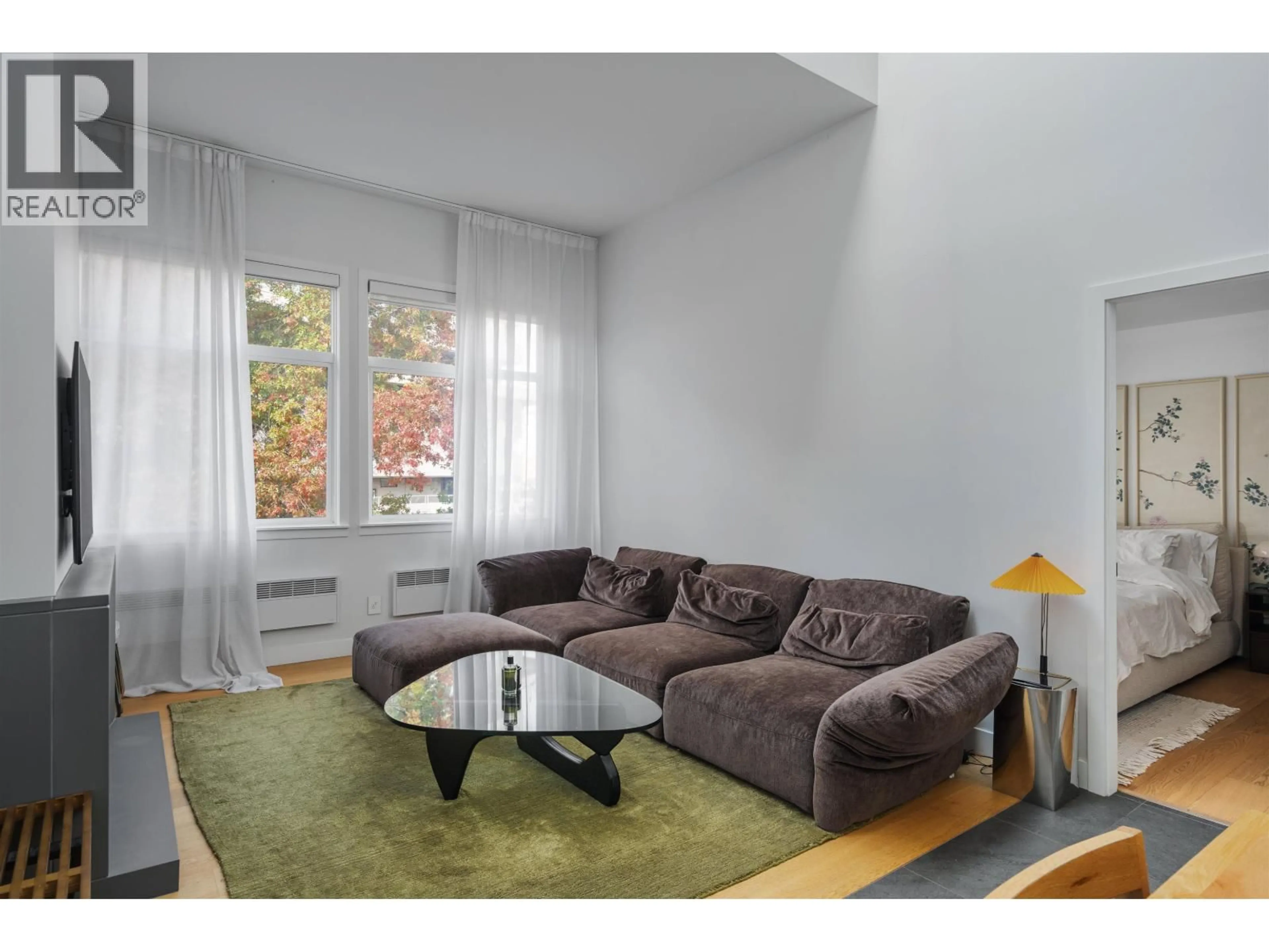 Living room with furniture, unknown for 302 - 650 MOBERLY ROAD, Vancouver British Columbia V5Z4J1