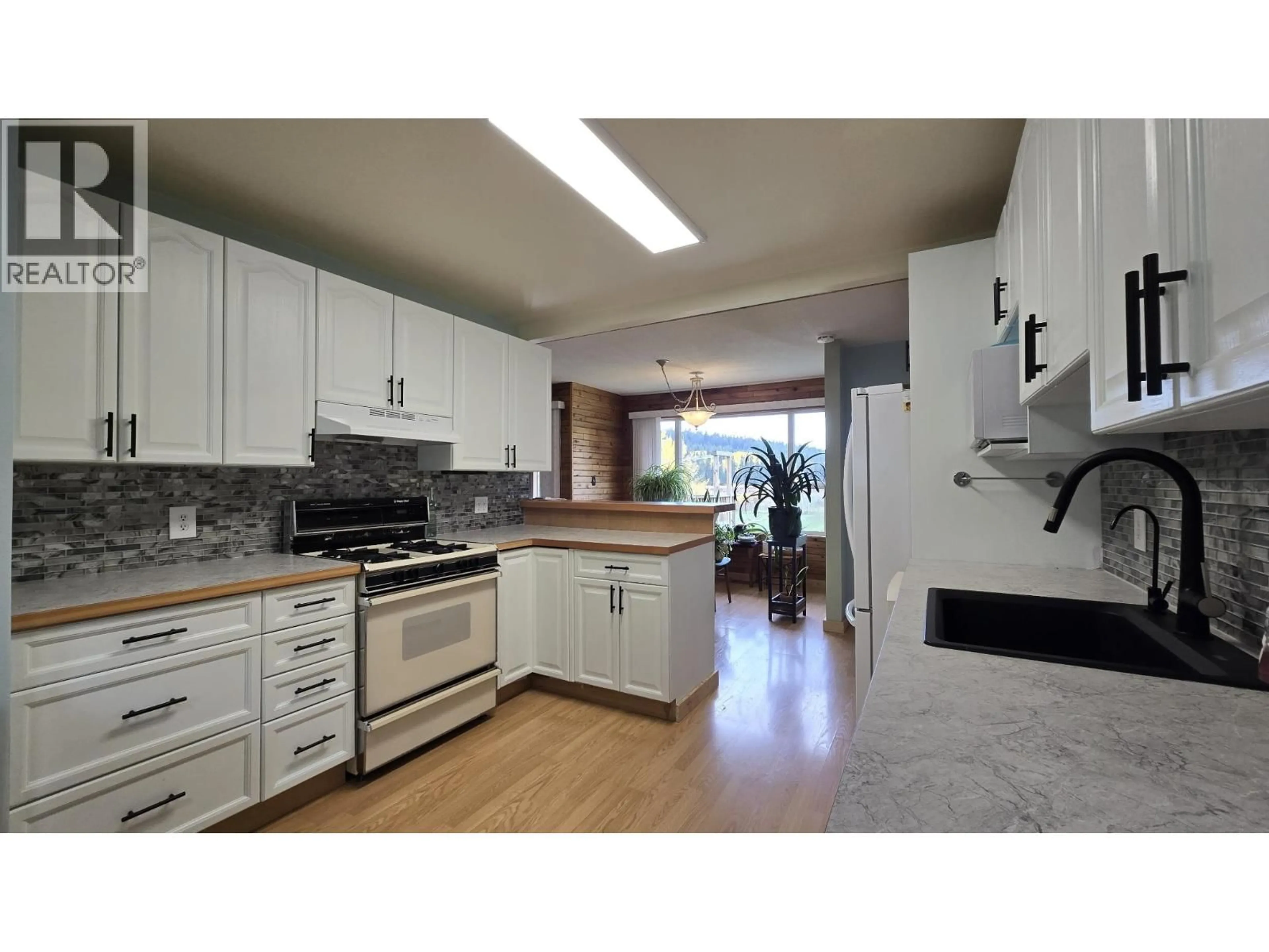 Open concept kitchen, unknown for 5199 KALLUM DRIVE, 108 Mile Ranch British Columbia V0K2Z0