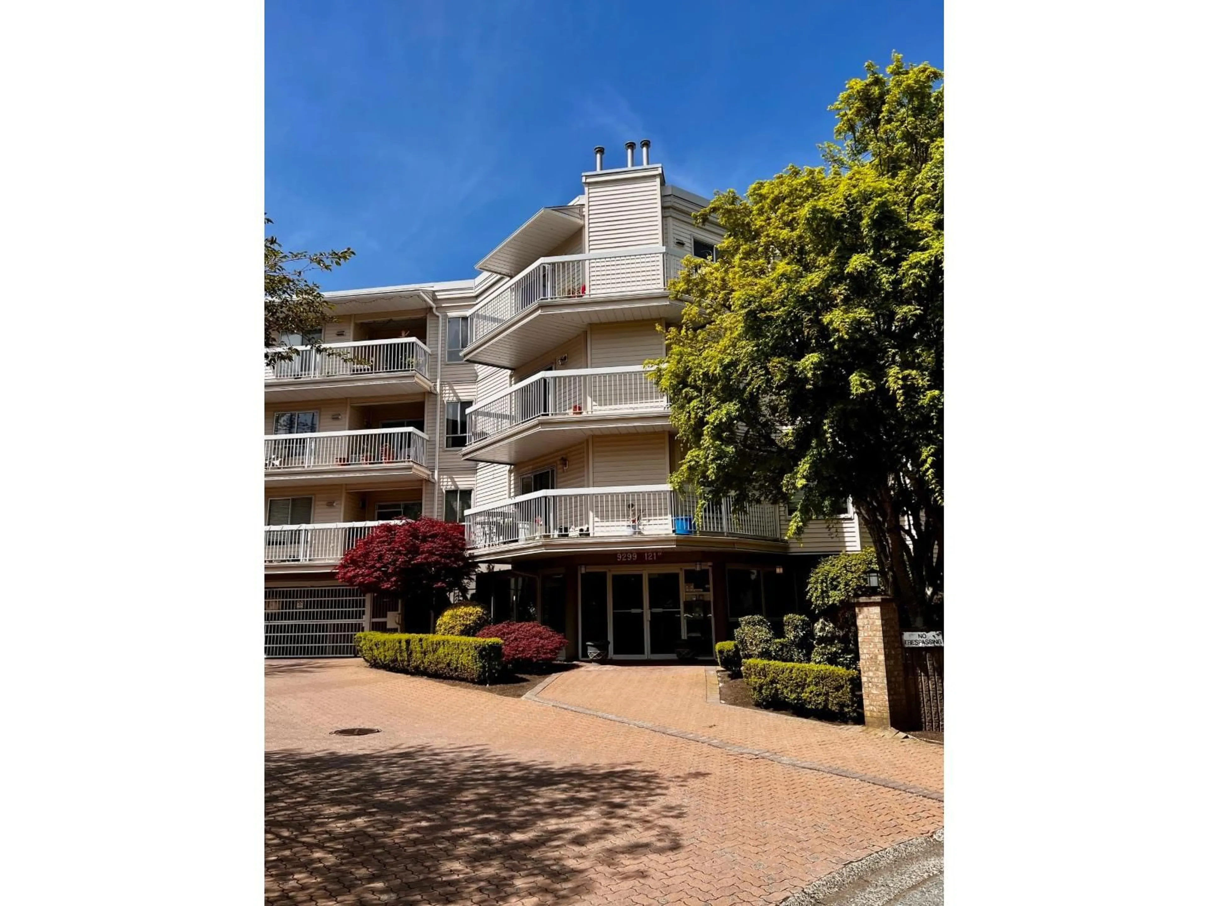 A pic from outside/outdoor area/front of a property/back of a property/a pic from drone, street for 313 - 9299 121 STREET, Surrey British Columbia V3V7X8
