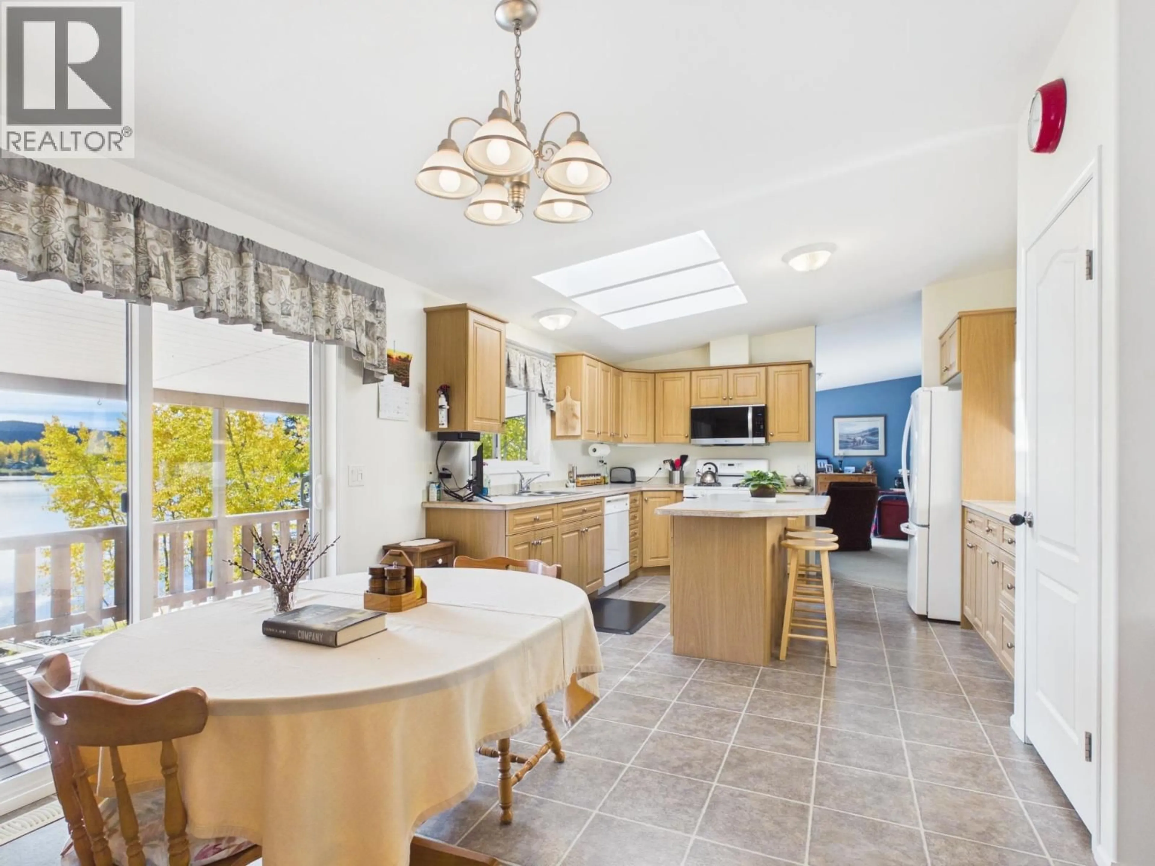 Open concept kitchen, ceramic/tile floor for 3722 CARSON ROAD, 150 Mile House British Columbia V2G2G0