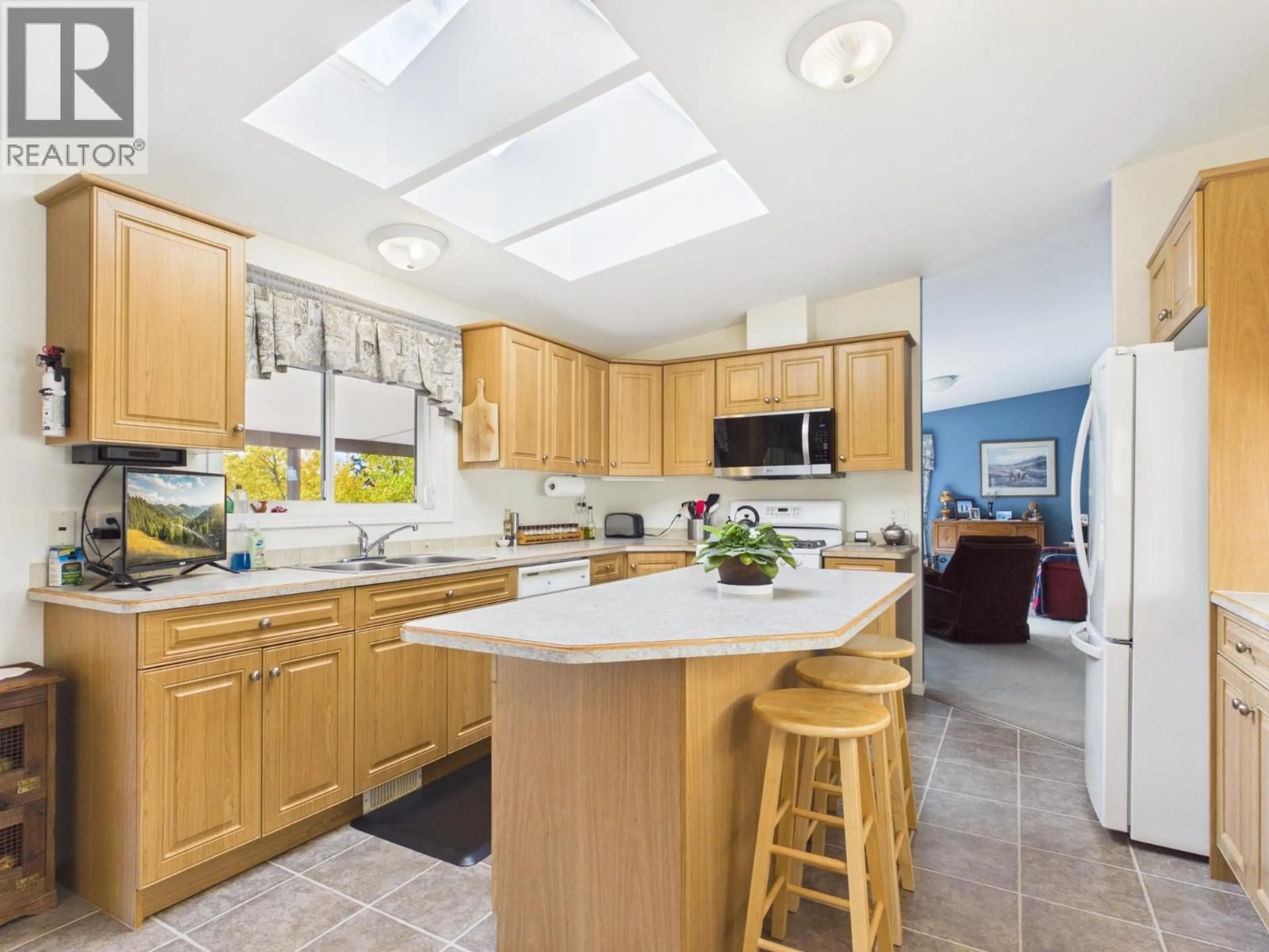 Open concept kitchen, ceramic/tile floor for 3722 CARSON ROAD, 150 Mile House British Columbia V2G2G0