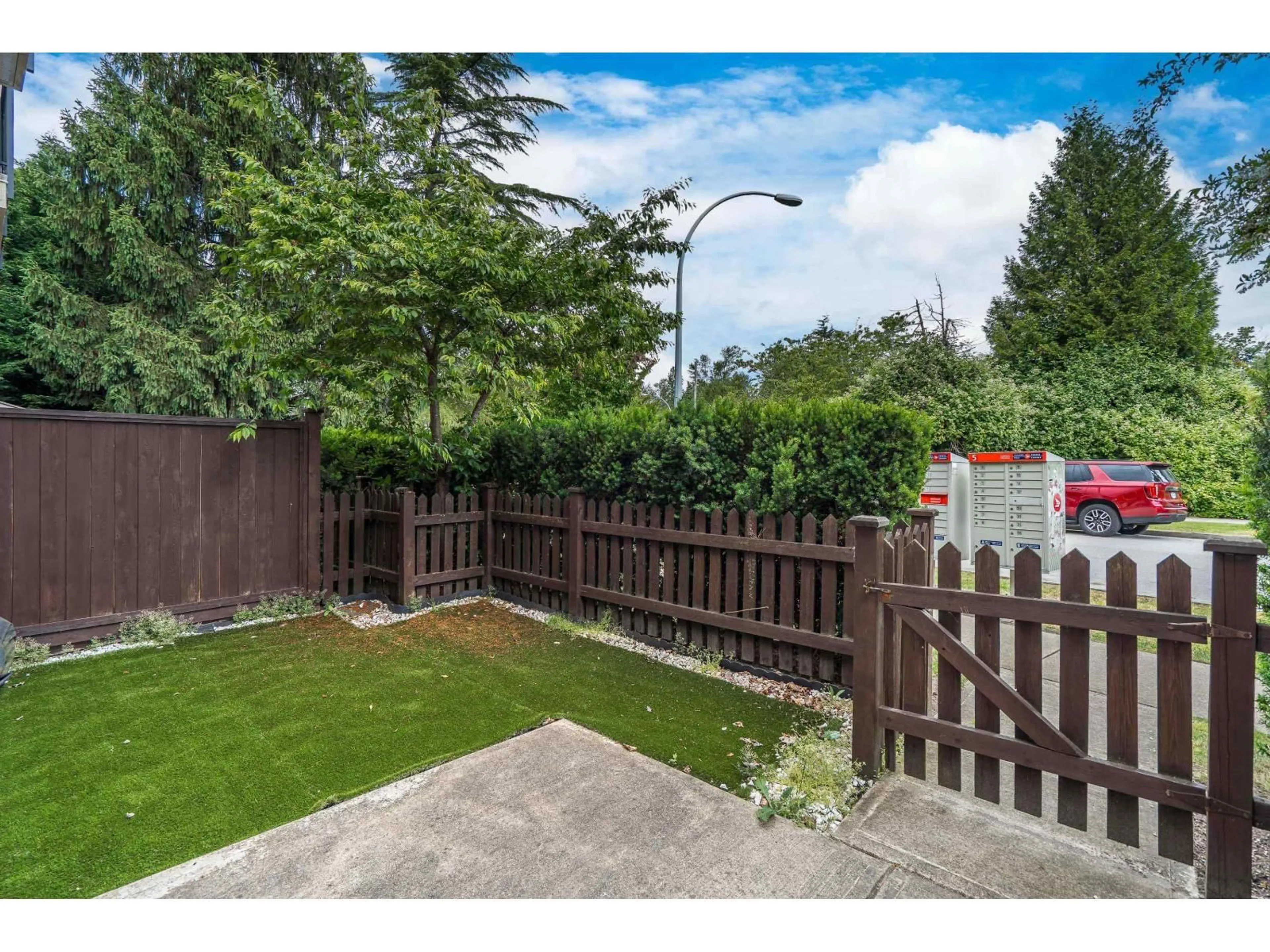 A pic from outside/outdoor area/front of a property/back of a property/a pic from drone, street for 14 - 6945 185 STREET, Surrey British Columbia V4N6N4