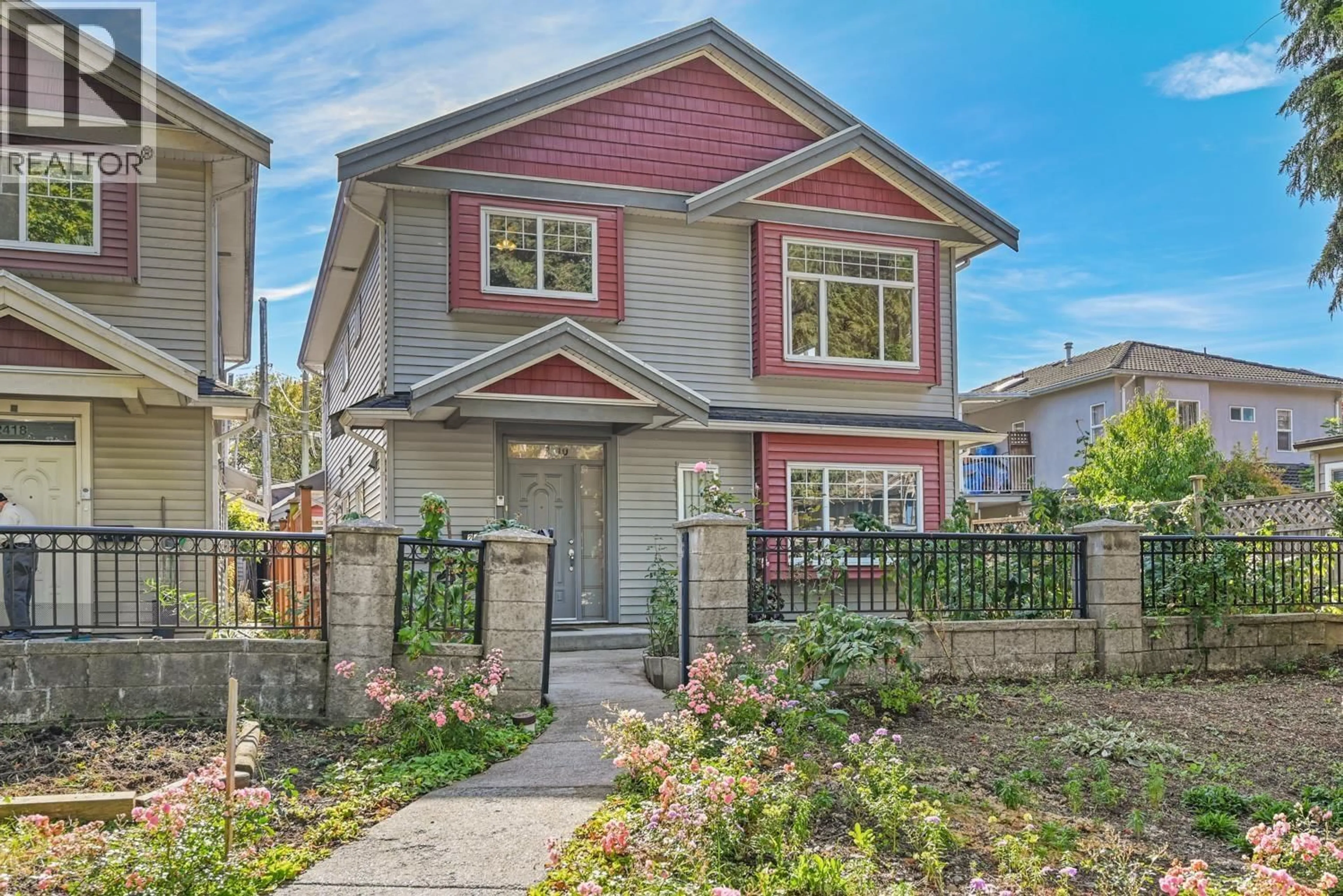 Home with vinyl exterior material, street for 2410 E 19TH AVENUE, Vancouver British Columbia V5M2R9