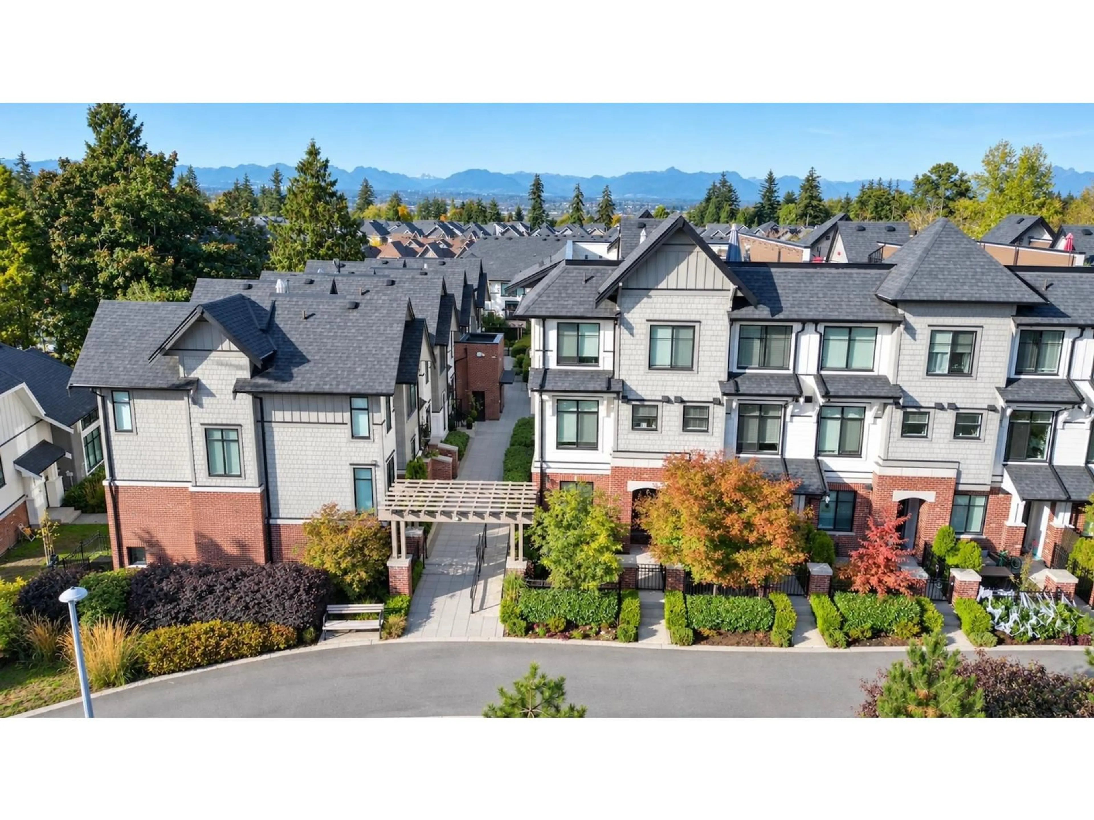 A pic from outside/outdoor area/front of a property/back of a property/a pic from drone, mountain view for 203 - 16528 24A AVENUE, Surrey British Columbia V3Z0P4